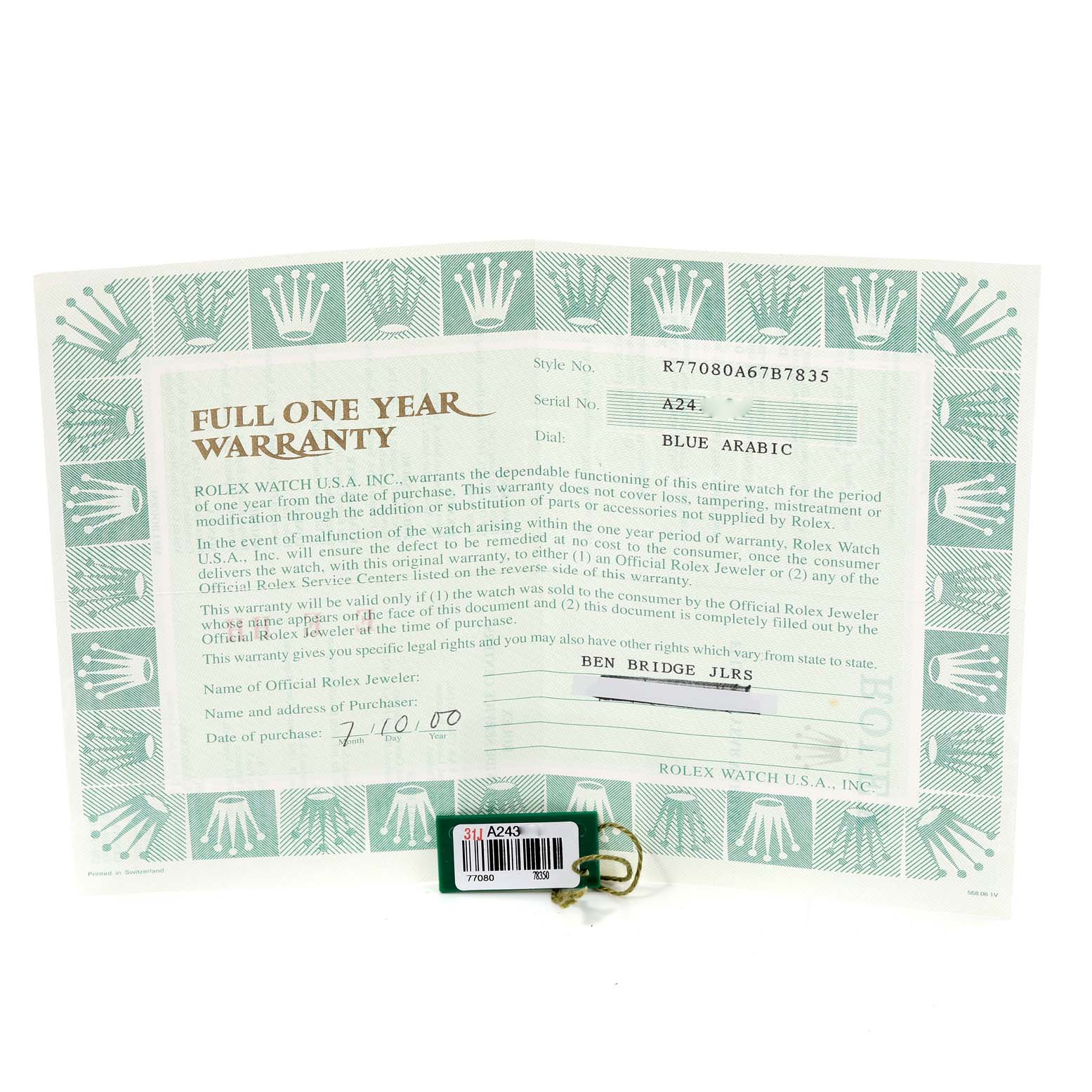 The image shows a warranty certificate and tag for a Rolex Mid-Size 77080 Women
s Stainless Steel Blue Dial 77080 Women
s Stainless Steel Blue Dial model watch.