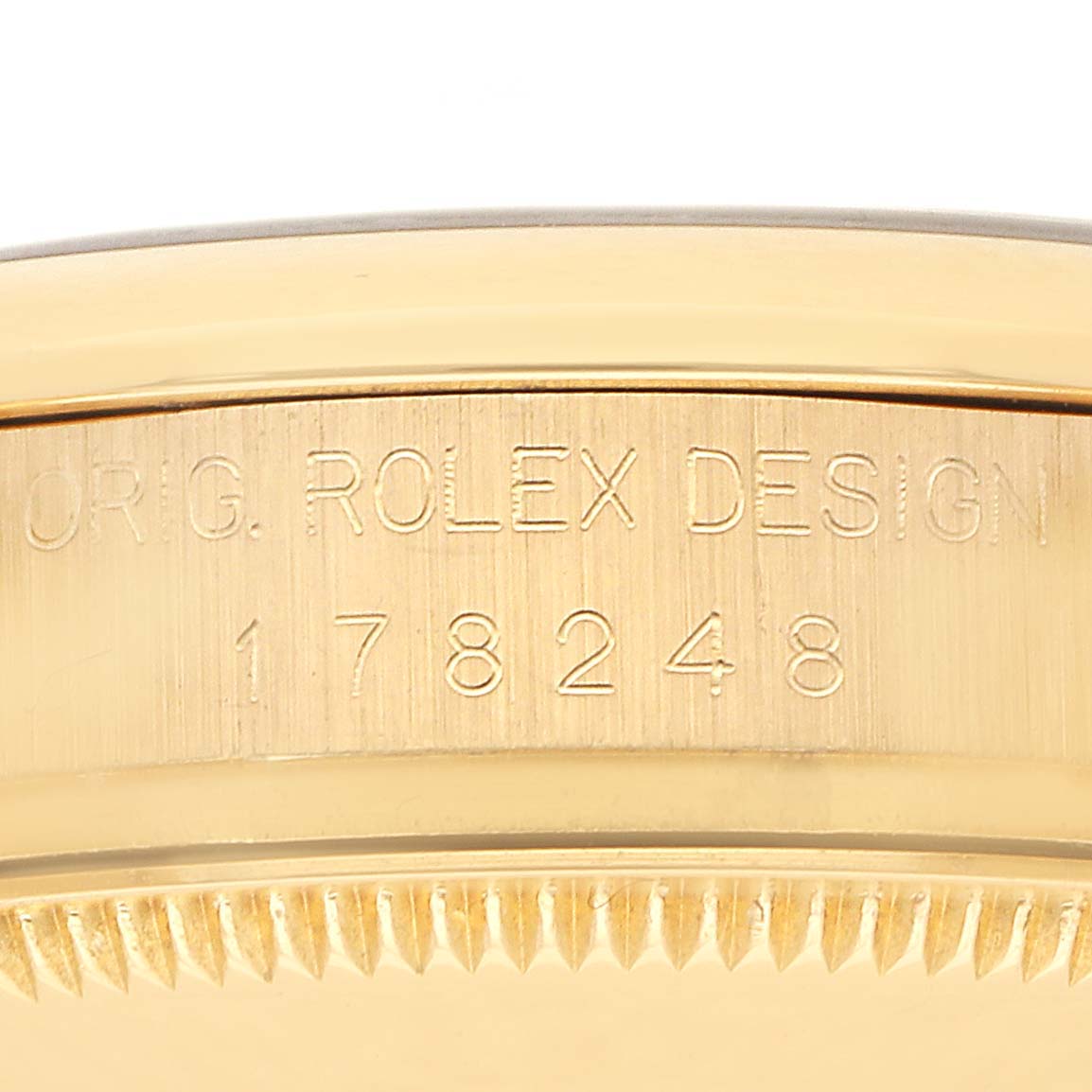The image shows a close-up of the side of a Mid-Size Rolex watch, displaying the model number and "ORIG. ROLEX DESIGN" engraving.