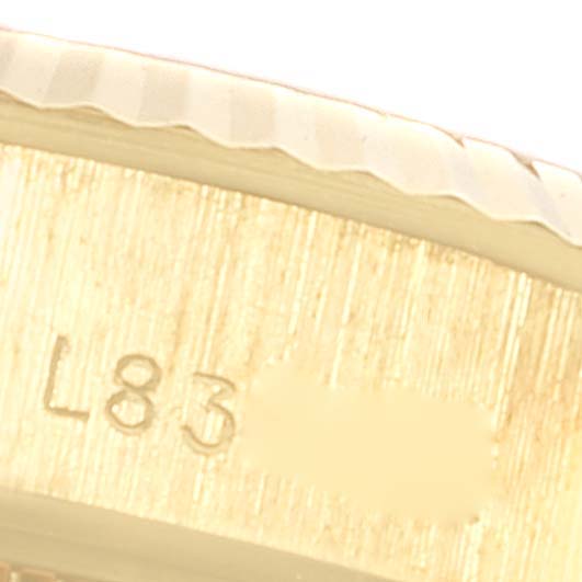 The image shows a close-up of the engraving on the bezel of a Rolex President 69178 Women
s Yellow Gold Champagne Dial 69178 Women
s Yellow Gold Champagne Dial model watch.