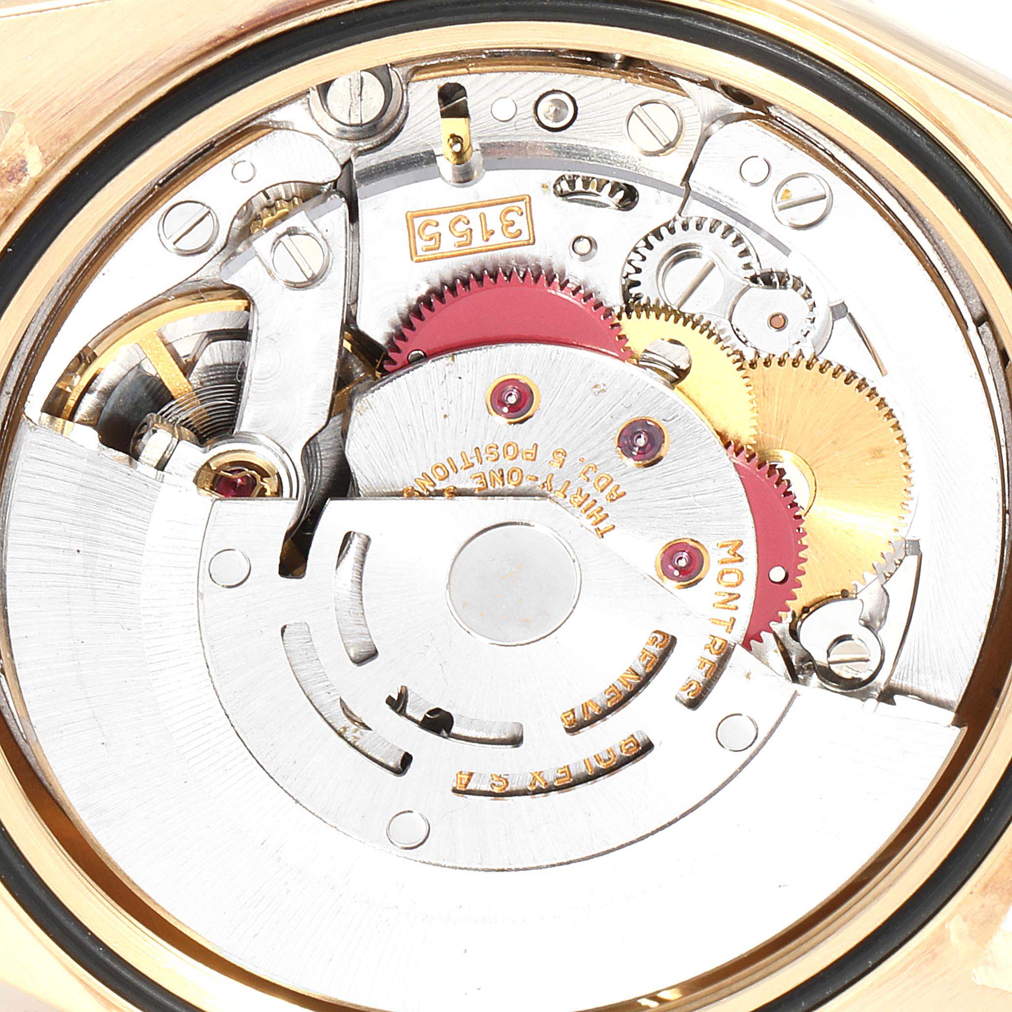 This is a close-up view of the internal mechanical movement of the Rolex President 18238 Men
s Yellow Gold White Dial 18238 Men
s Yellow Gold White Dial model watch.