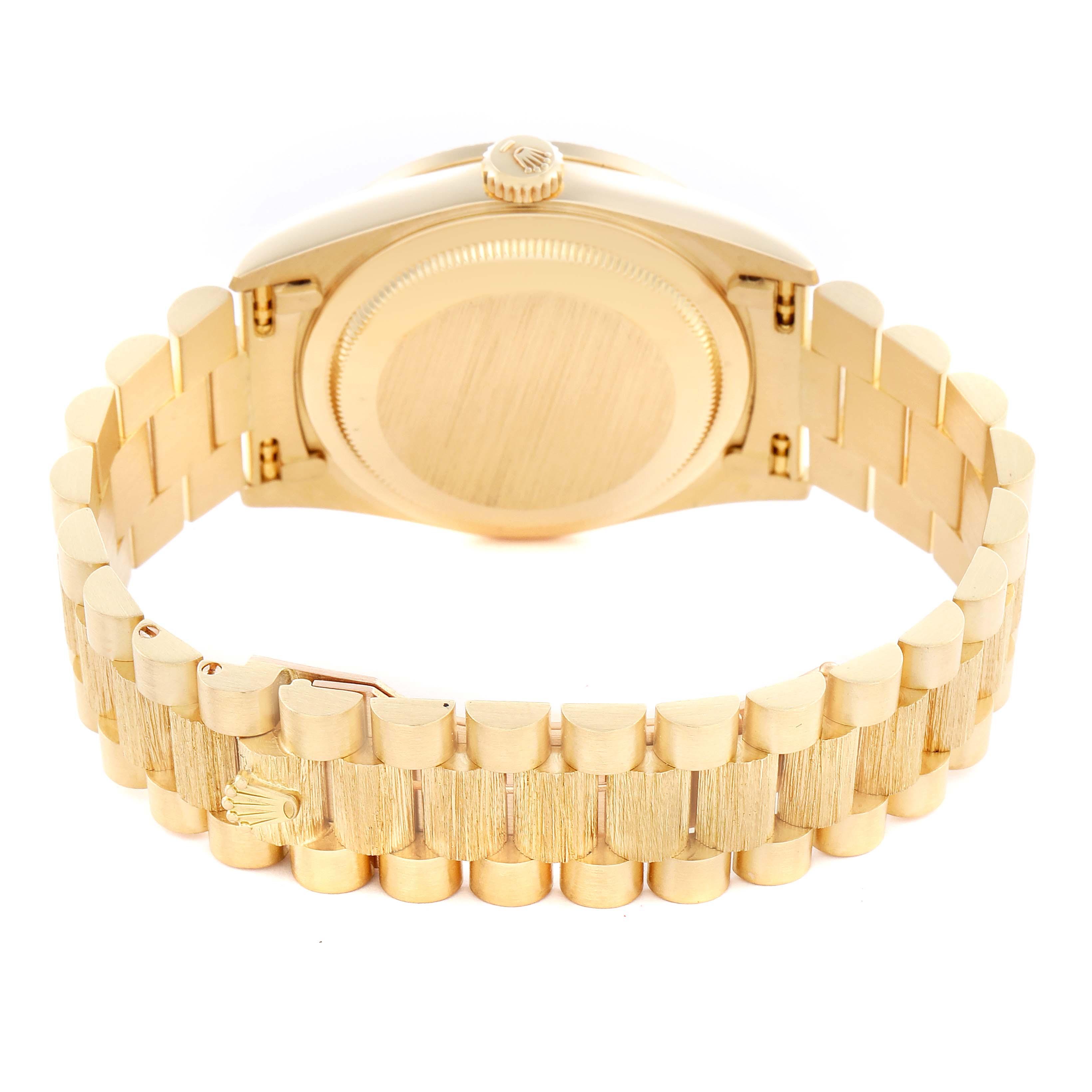 The image shows the back view of a Rolex President 18308 Men
s Yellow Gold Champagne Dial 18308 Men
s Yellow Gold Champagne Dial model, highlighting its case back, bracelet, and crown.