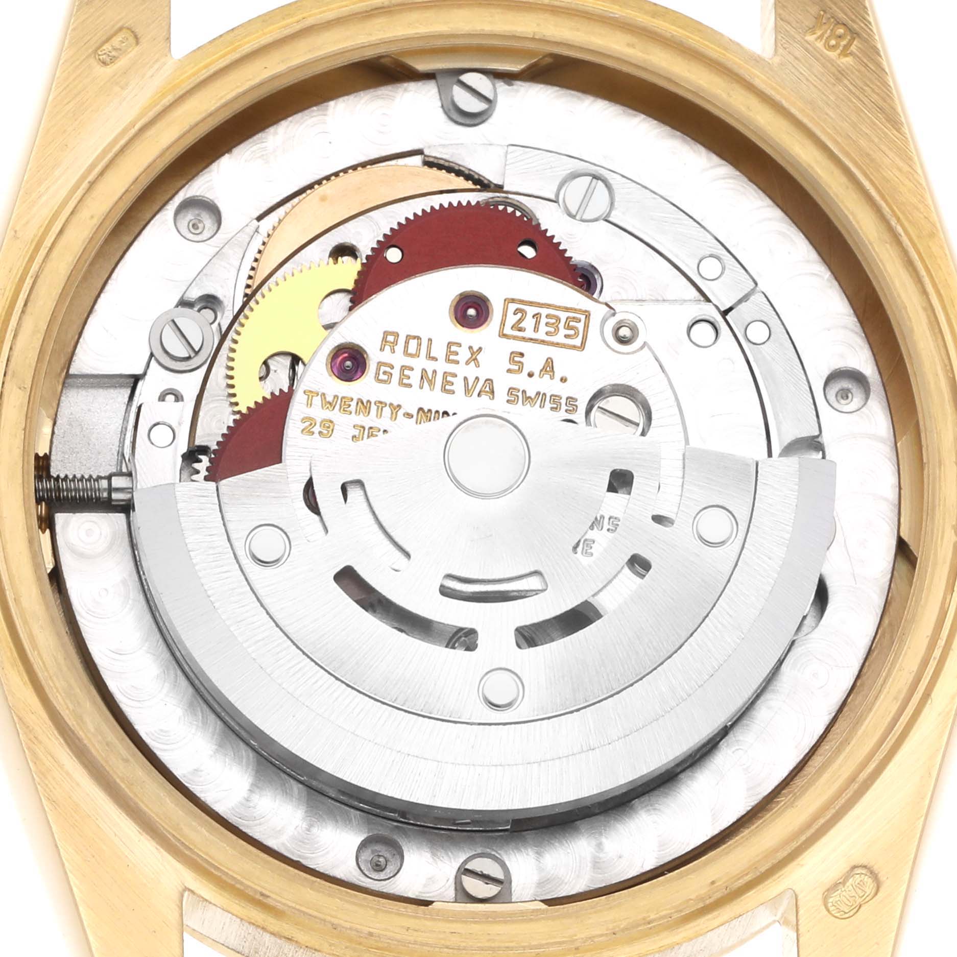 The image shows the back view of a Rolex Mid-Size watch, highlighting the movement and gears inside.