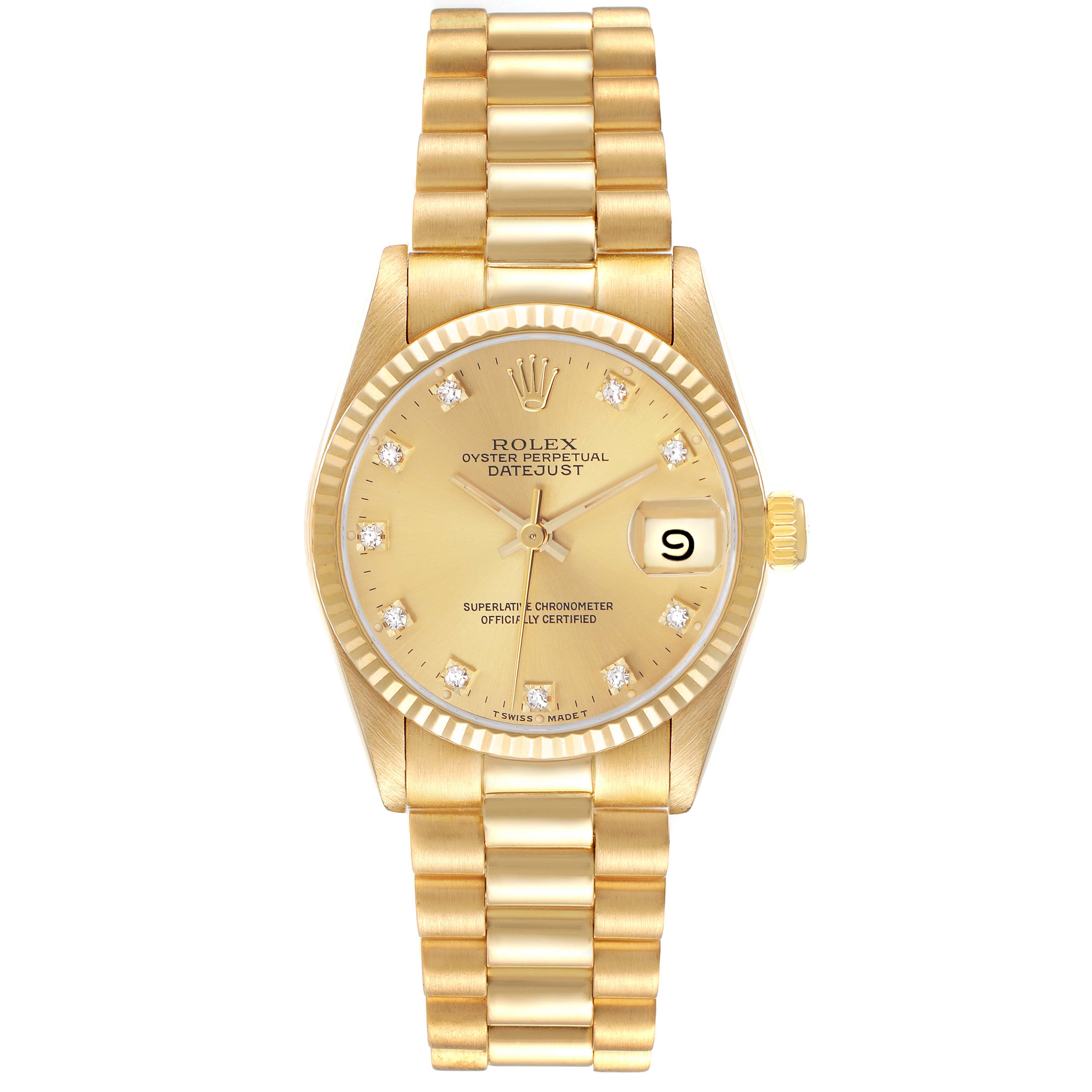 The Rolex Mid-Size watch is shown from a top view, displaying the full face, bracelet, and date window.