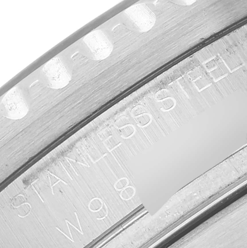This close-up image shows a part of the bezel and the engraved text on the case of a Rolex Sea-Dweller 16600 Men
s Stainless Steel Black Dial 16600 Men
s Stainless Steel Black Dial watch.