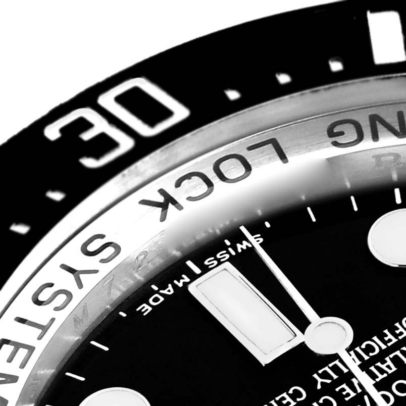 The image shows a close-up of the bezel and dial of a Rolex Sea-Dweller 116660 Men's Stainless Steel Black Dial 116660 Men's Stainless Steel Black Dial, highlighting the ceramic bezel markings and "Swiss Made" text.