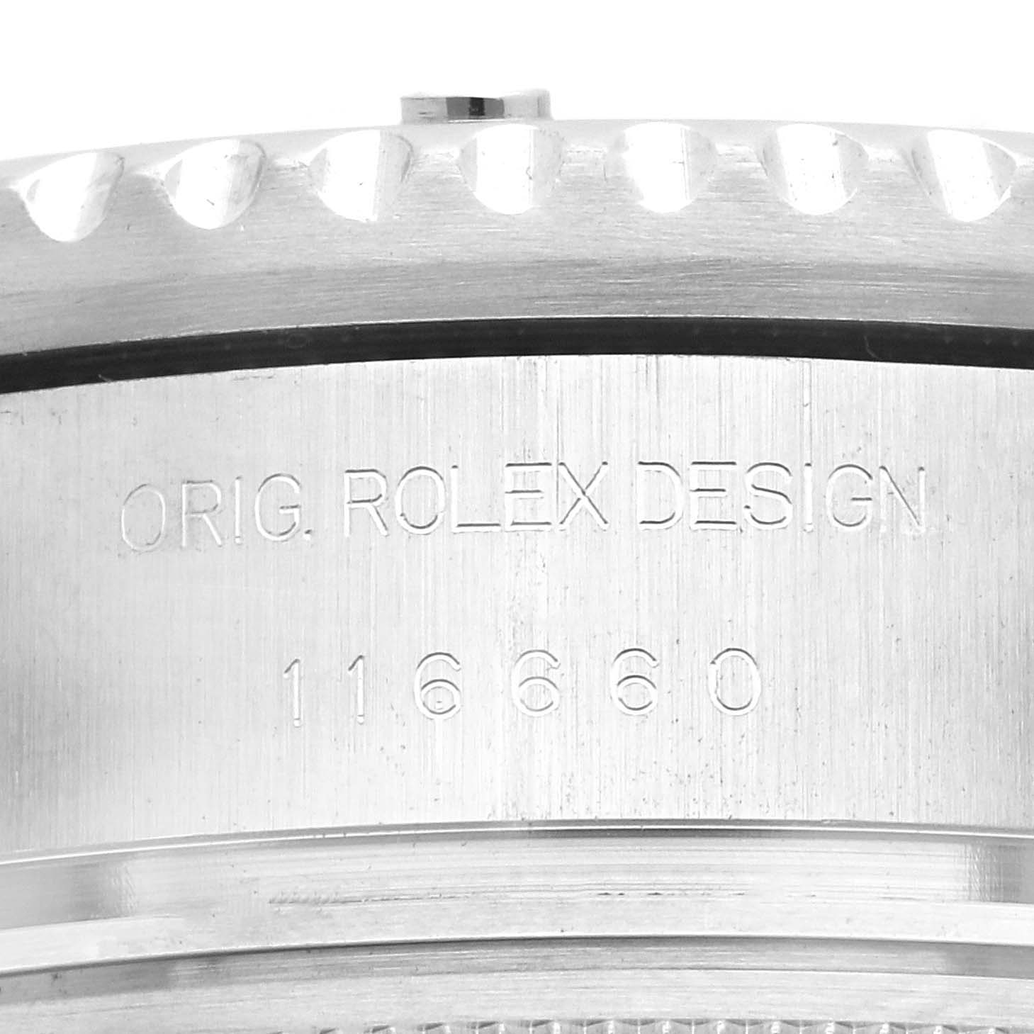 The image shows a close-up of the side casing of a Rolex Sea-Dweller 116660 Men's Stainless Steel Black Dial 116660 Men's Stainless Steel Black Dial, displaying its engraving and serrated bezel edge.