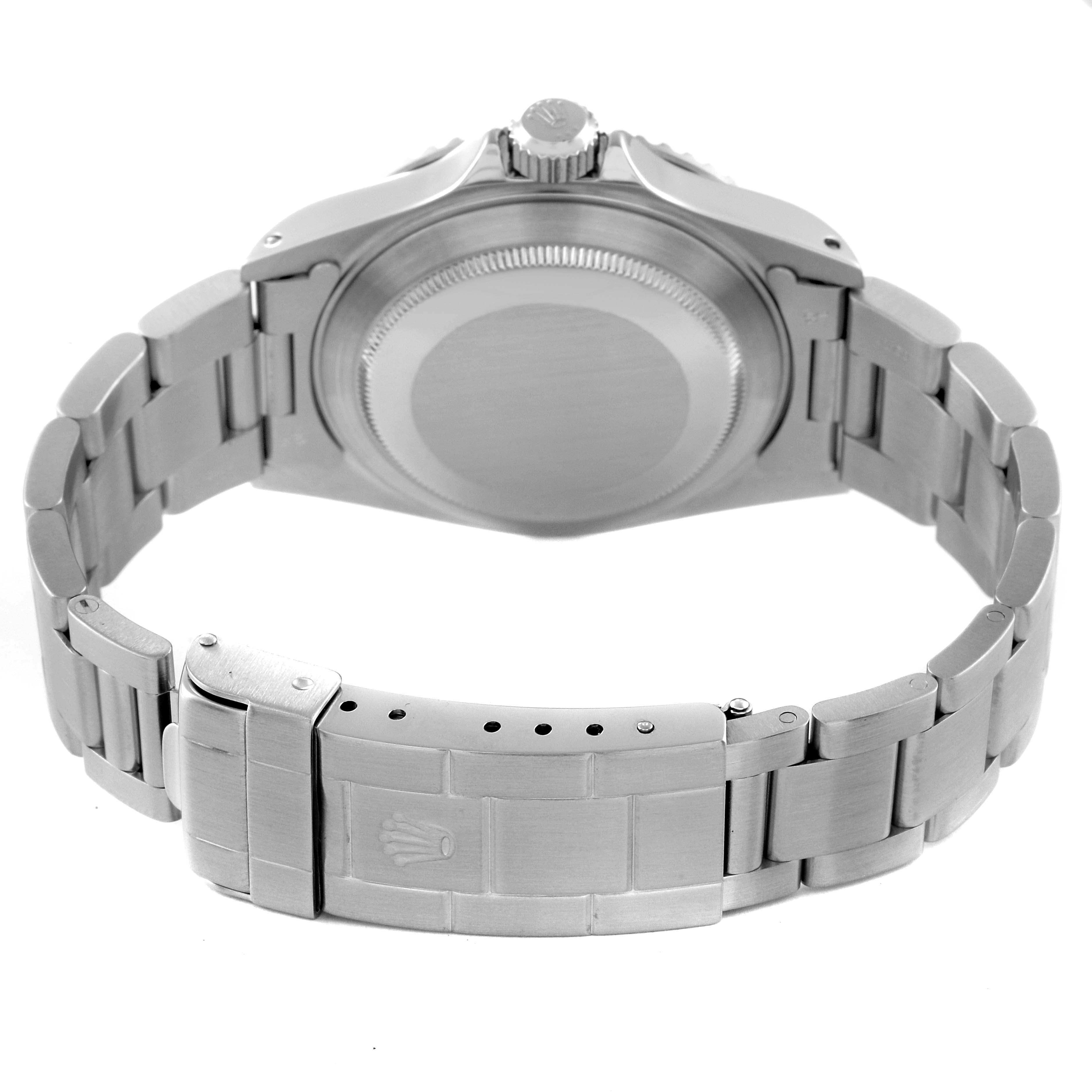 This image shows the back view of a Rolex Submariner 14060 Men
s Stainless Steel Black Dial 14060 Men
s Stainless Steel Black Dial watch, highlighting its case back, clasp, and bracelet.