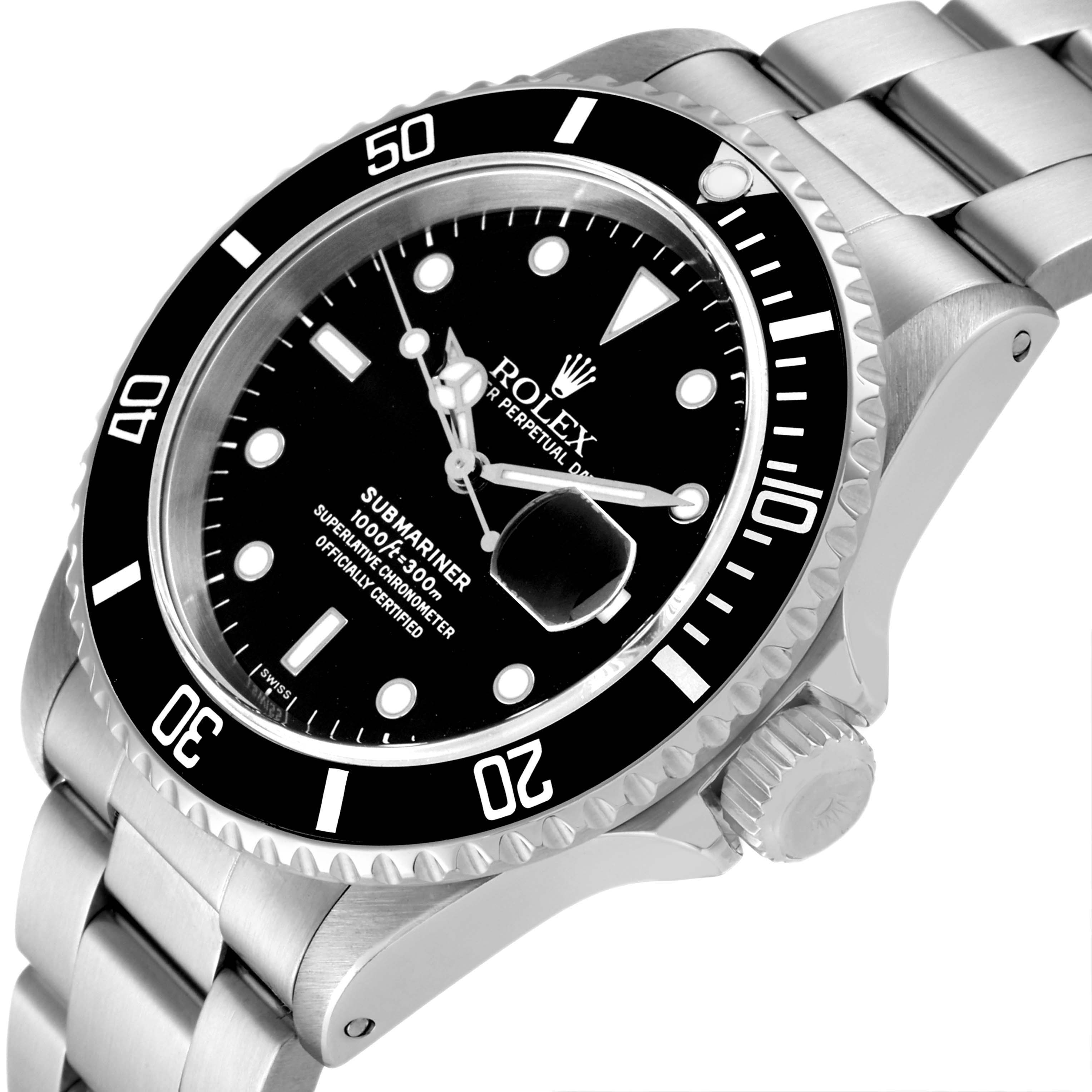 The Rolex Submariner 16610 Men
s Stainless Steel Black Dial 16610 Men
s Stainless Steel Black Dial watch is shown at an angled view highlighting the face, bezel, crown, and part of the bracelet.