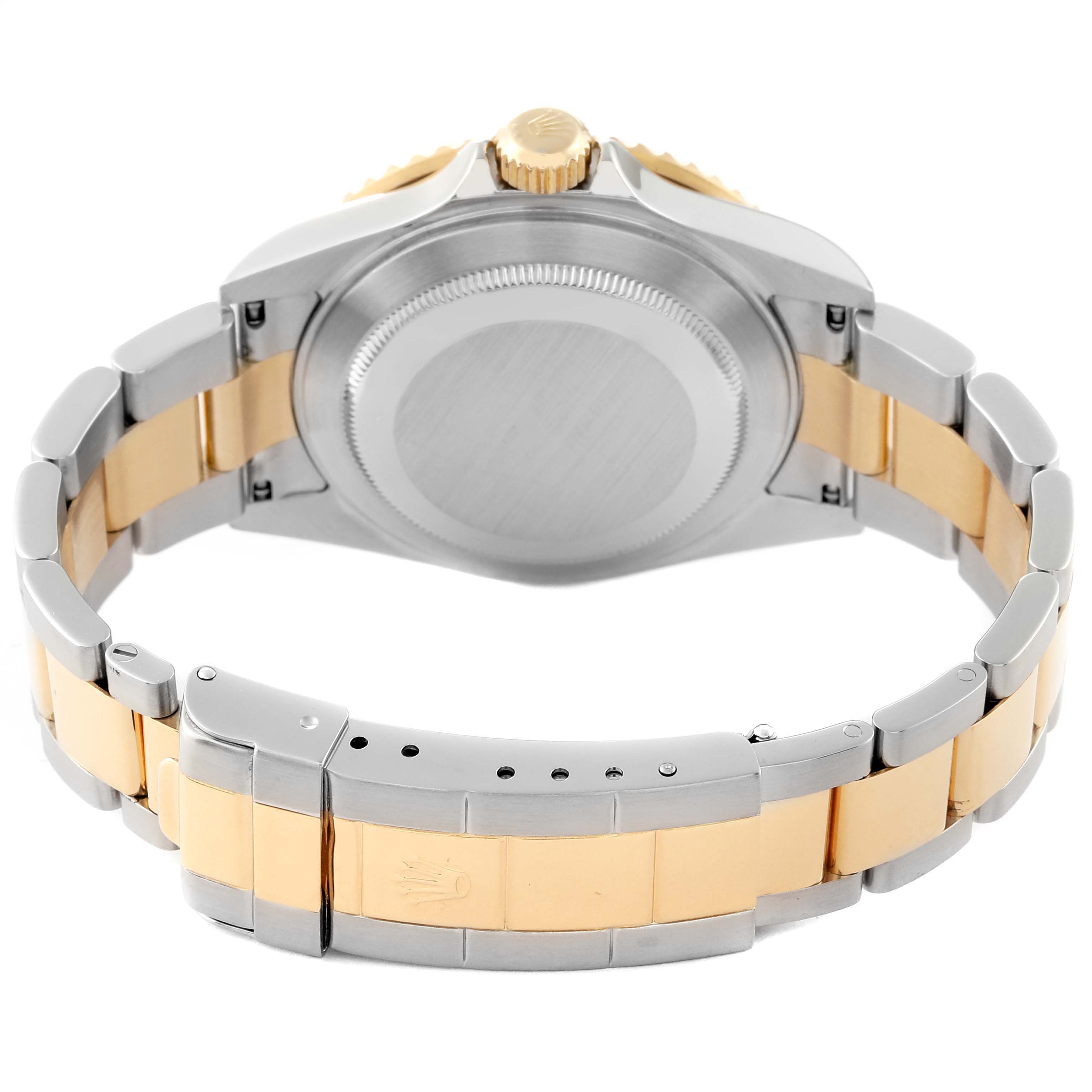 This image shows the back case and bracelet of a Rolex Submariner 16613 Men's Steel and Gold (two tone) Blue Dial 16613 Men's Steel and Gold (two tone) Blue Dial watch, emphasizing the clasp and bracelet links.