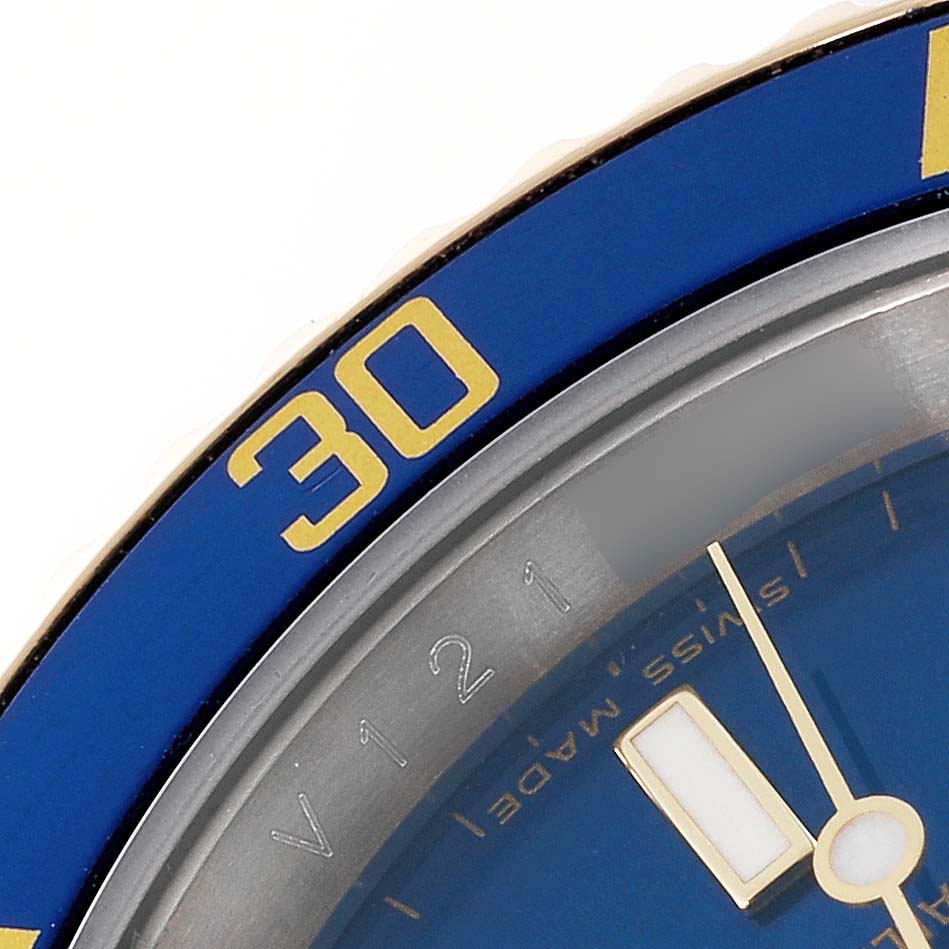 This is a close-up angle showing the dial and bezel of the Rolex Submariner 16613 Men's Steel and Gold (two tone) Blue Dial 16613 Men's Steel and Gold (two tone) Blue Dial watch, highlighting the "30" marker.
