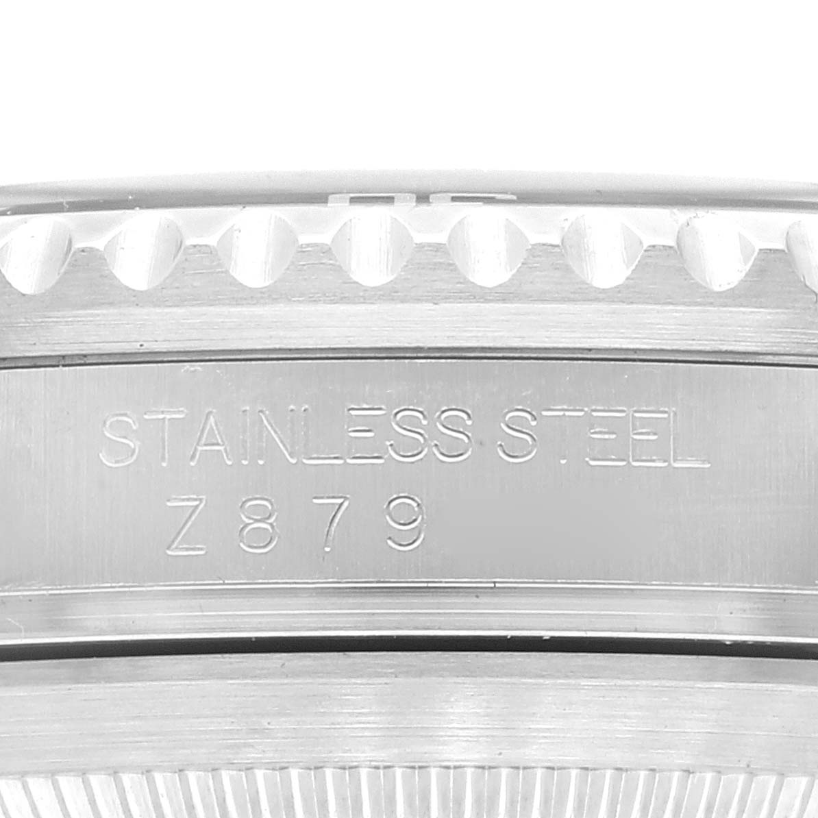Close-up of the case side edge of the Rolex Submariner 16610 Men
s Stainless Steel Black Dial 16610 Men
s Stainless Steel Black Dial, showing the stainless steel marking and partially visible bezel edge.