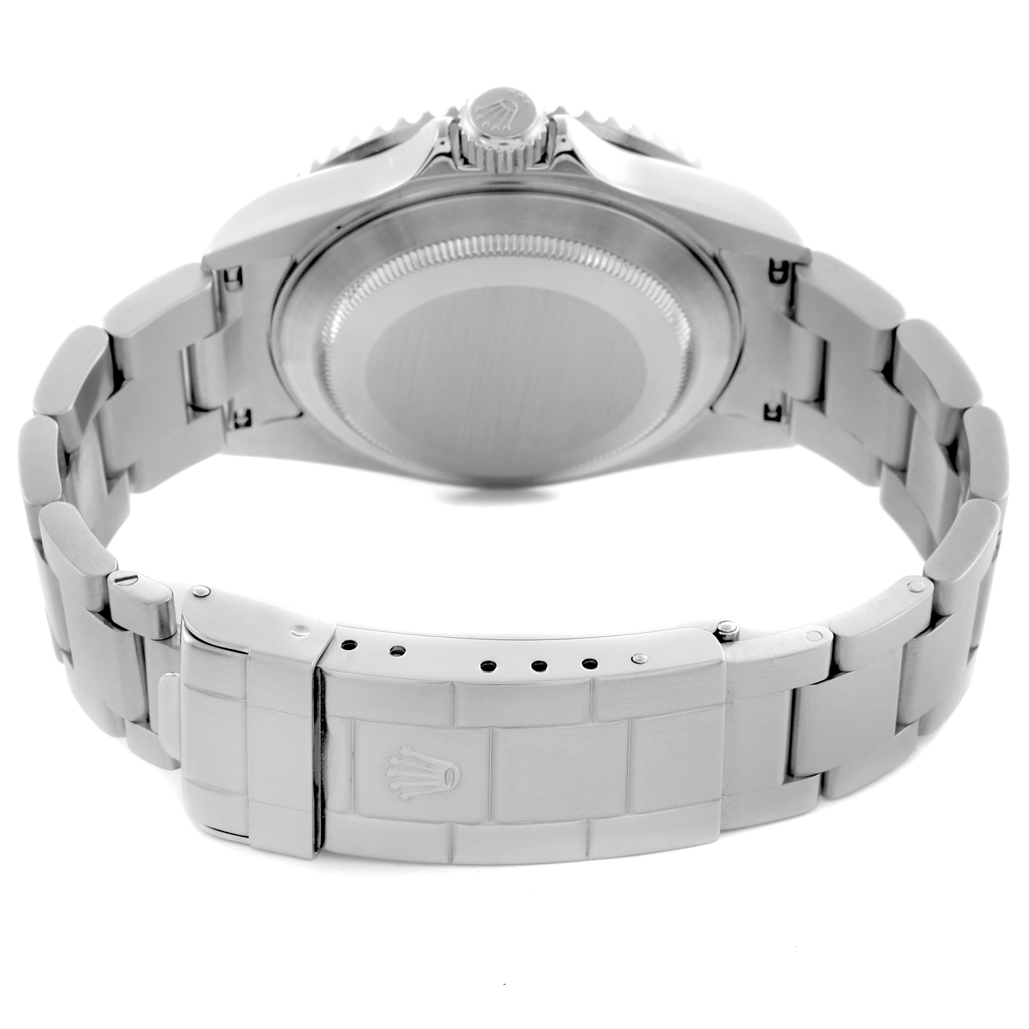 The image shows the back view of a Rolex Submariner 16610 Men's Stainless Steel Black Dial 16610 Men's Stainless Steel Black Dial watch, displaying the case back, crown, and the bracelet with clasp.