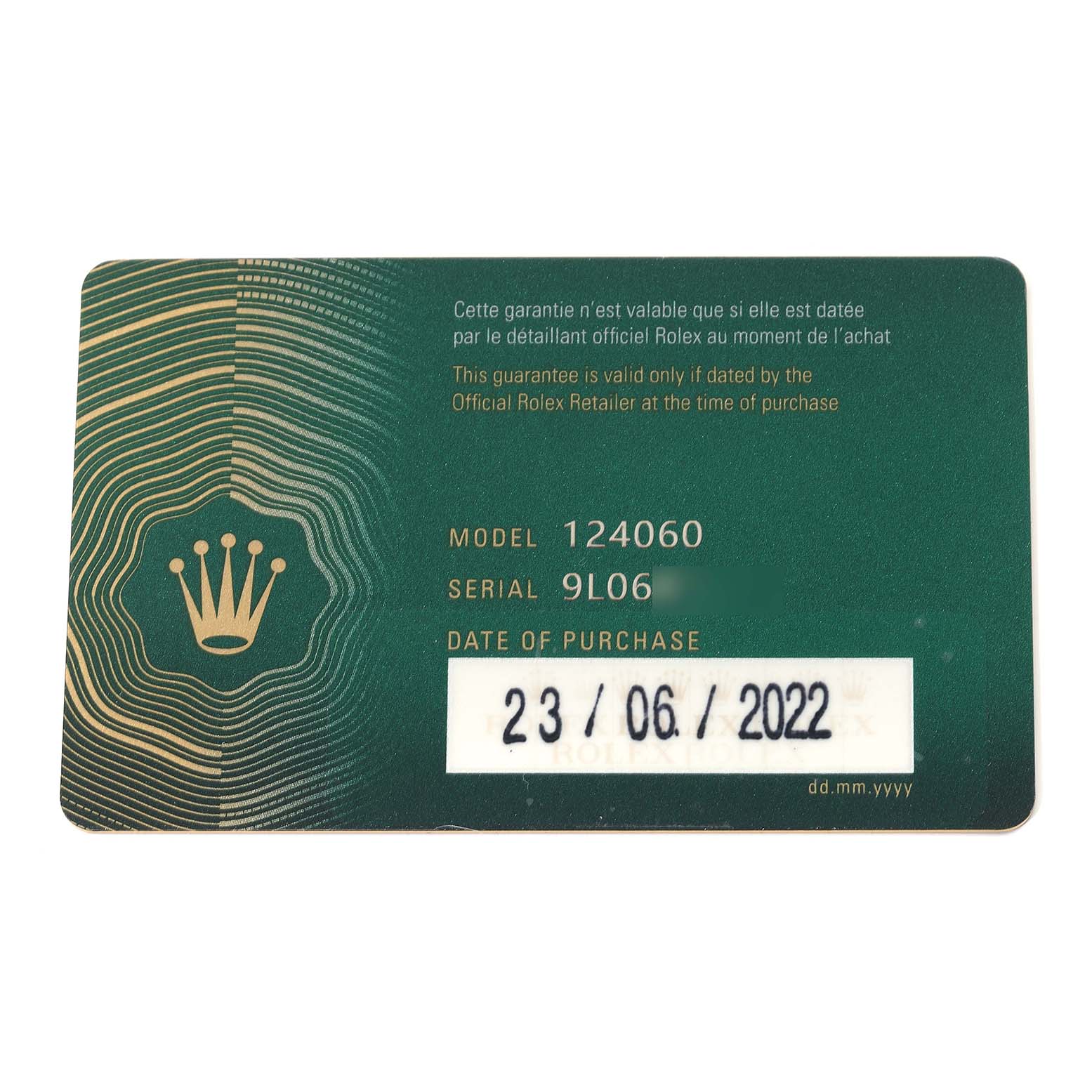 This is an image of a warranty card for the Rolex Submariner 124060 Men
s Stainless Steel Black Dial 124060 Men
s Stainless Steel Black Dial model 124060, showing the model and serial number, and purchase date.