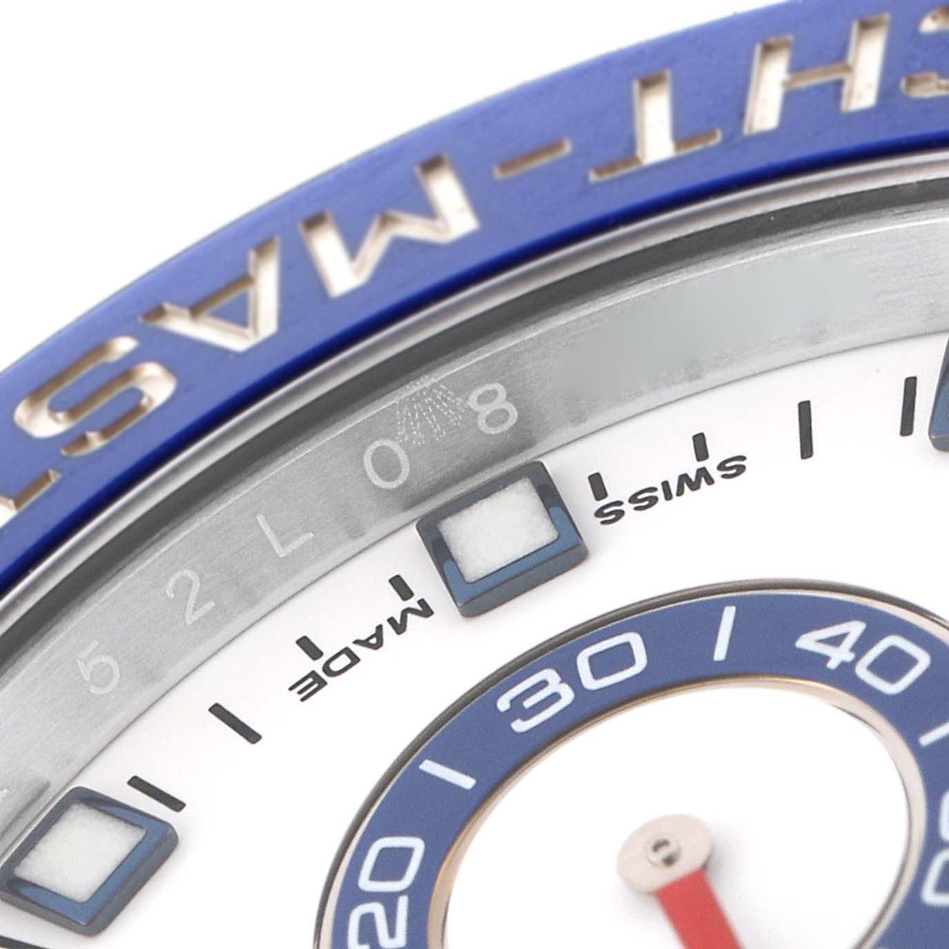 The image shows the bezel and part of the dial of a Rolex Yacht-Master 116680 Men's Stainless Steel White Dial 116680 Men's Stainless Steel White Dial watch, highlighting the "SWISS MADE" marking.