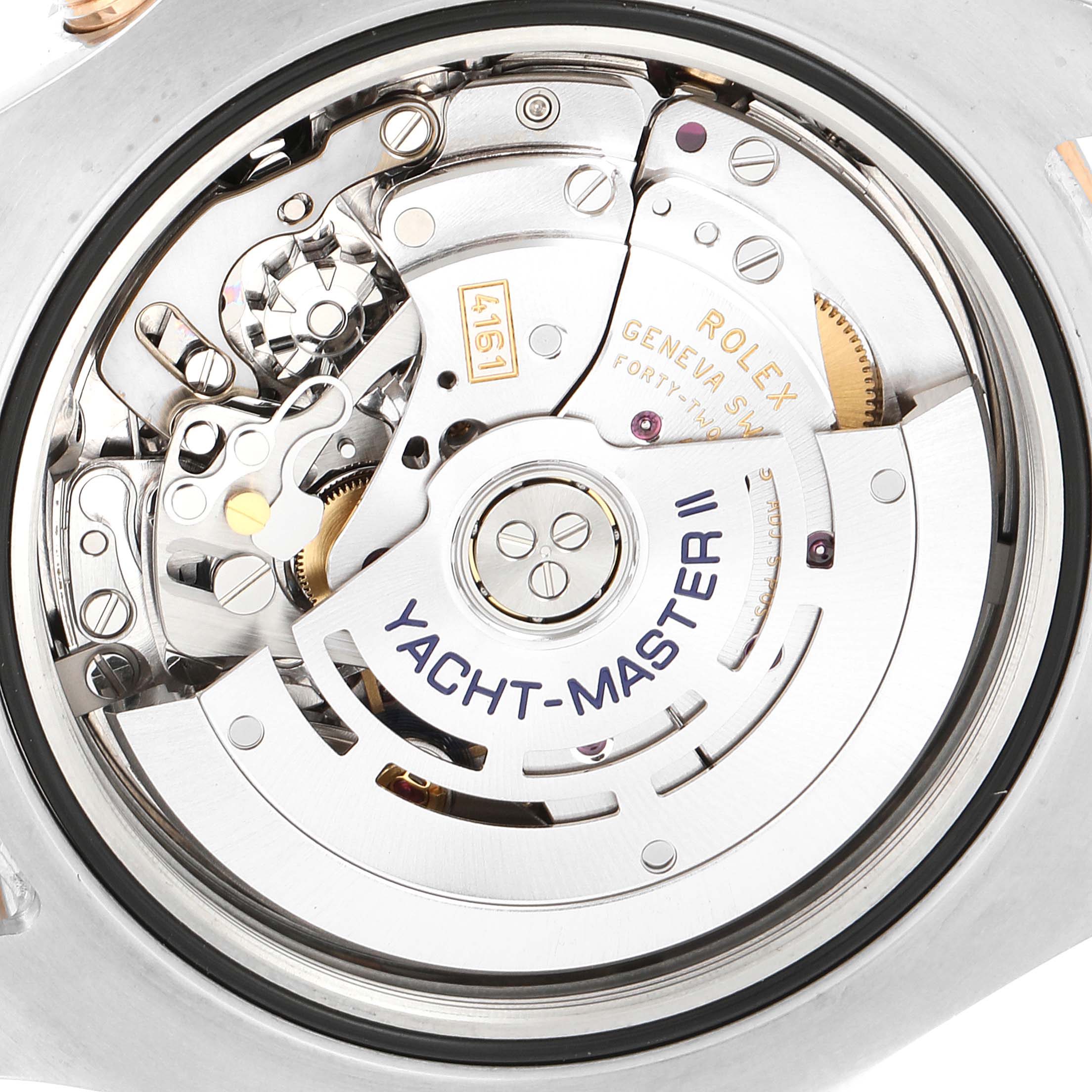 The image shows the inner mechanical movement of a Rolex Yacht-Master 116681 Men's Steel and Gold (two tone) White Dial 116681 Men's Steel and Gold (two tone) White Dial watch from a back angle.