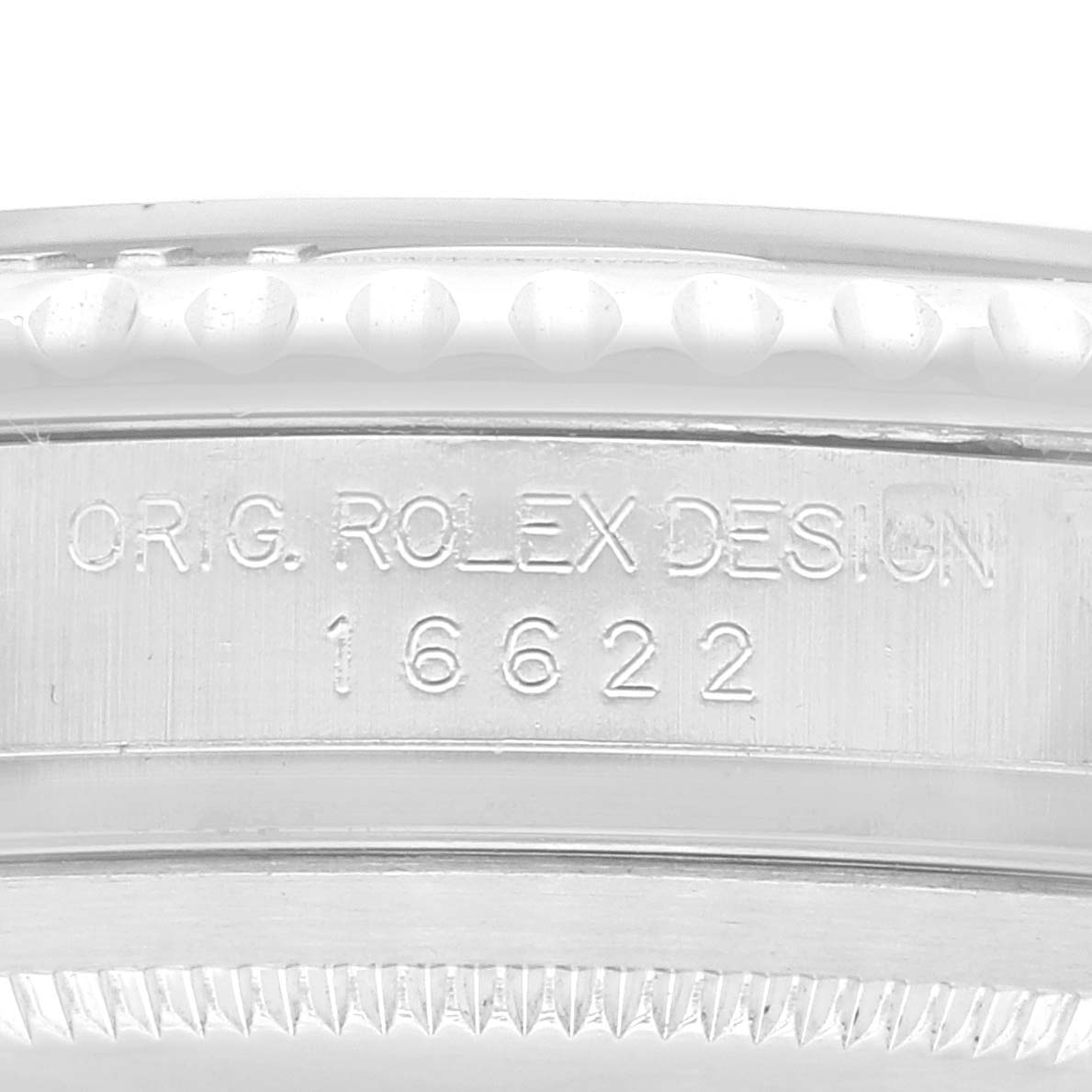 Close-up of the Yacht-Master Rolex watch case side, showing "ORIG. ROLEX DESIGN 16622" engraving.