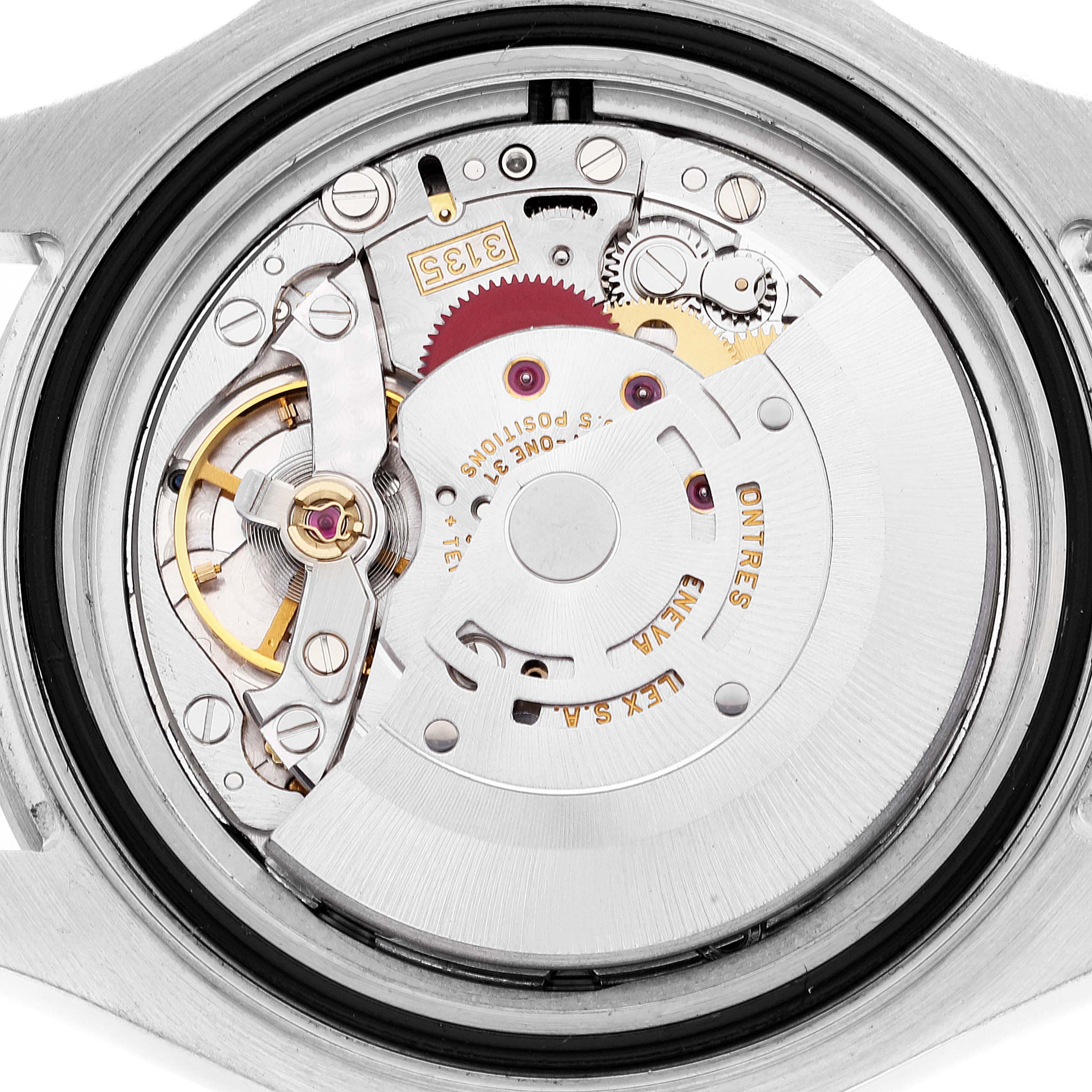 The image shows the movement mechanism of a Rolex Yacht-Master 16622 Men
s Stainless Steel Silver Dial 16622 Men
s Stainless Steel Silver Dial watch from a back angle, detailing its intricate internal components.
