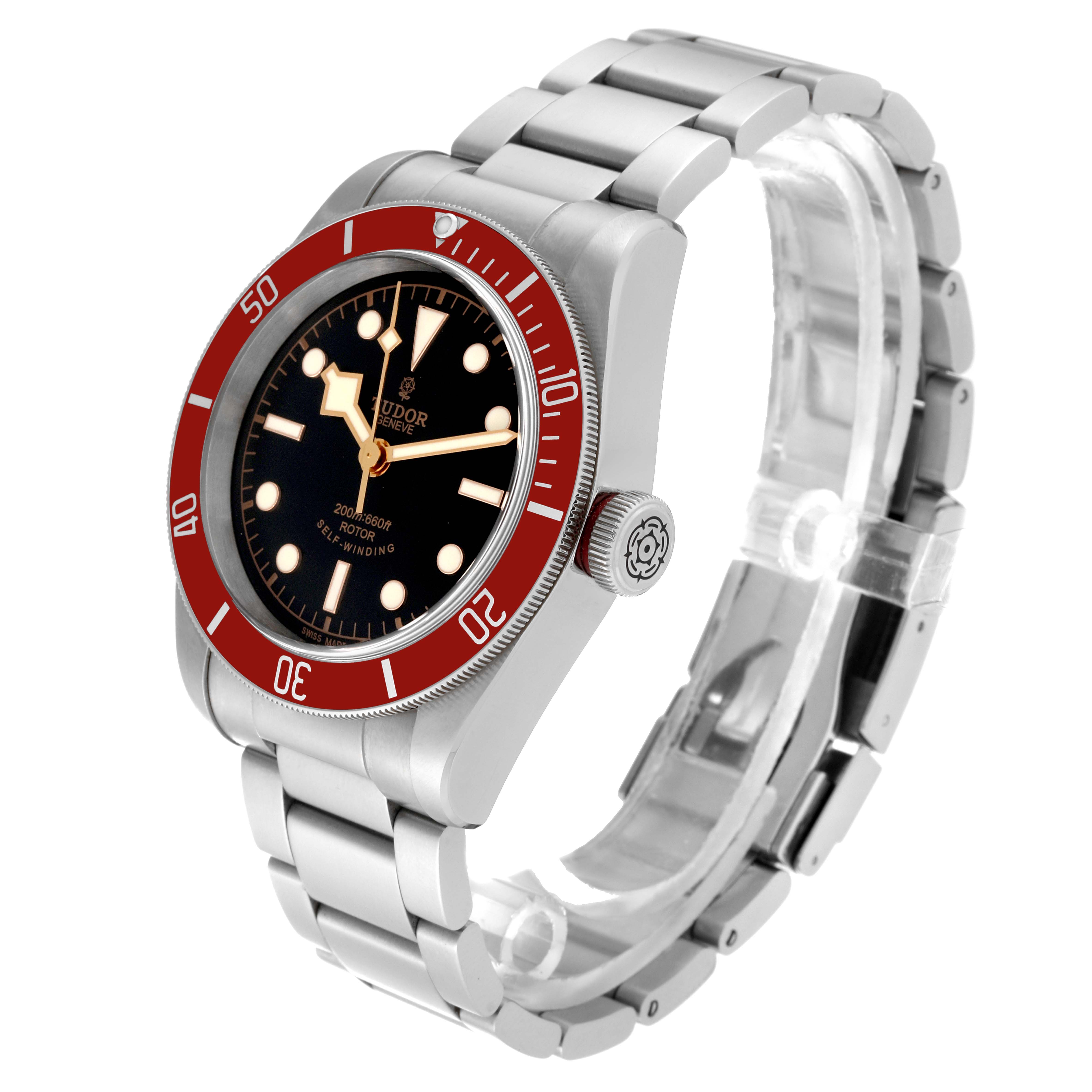 The Tudor Heritage Black Bay 79220R Men
s Stainless Steel Black Dial 79220R Men
s Stainless Steel Black Dial watch is shown from an angled view, highlighting its red bezel, black dial, and metal bracelet.