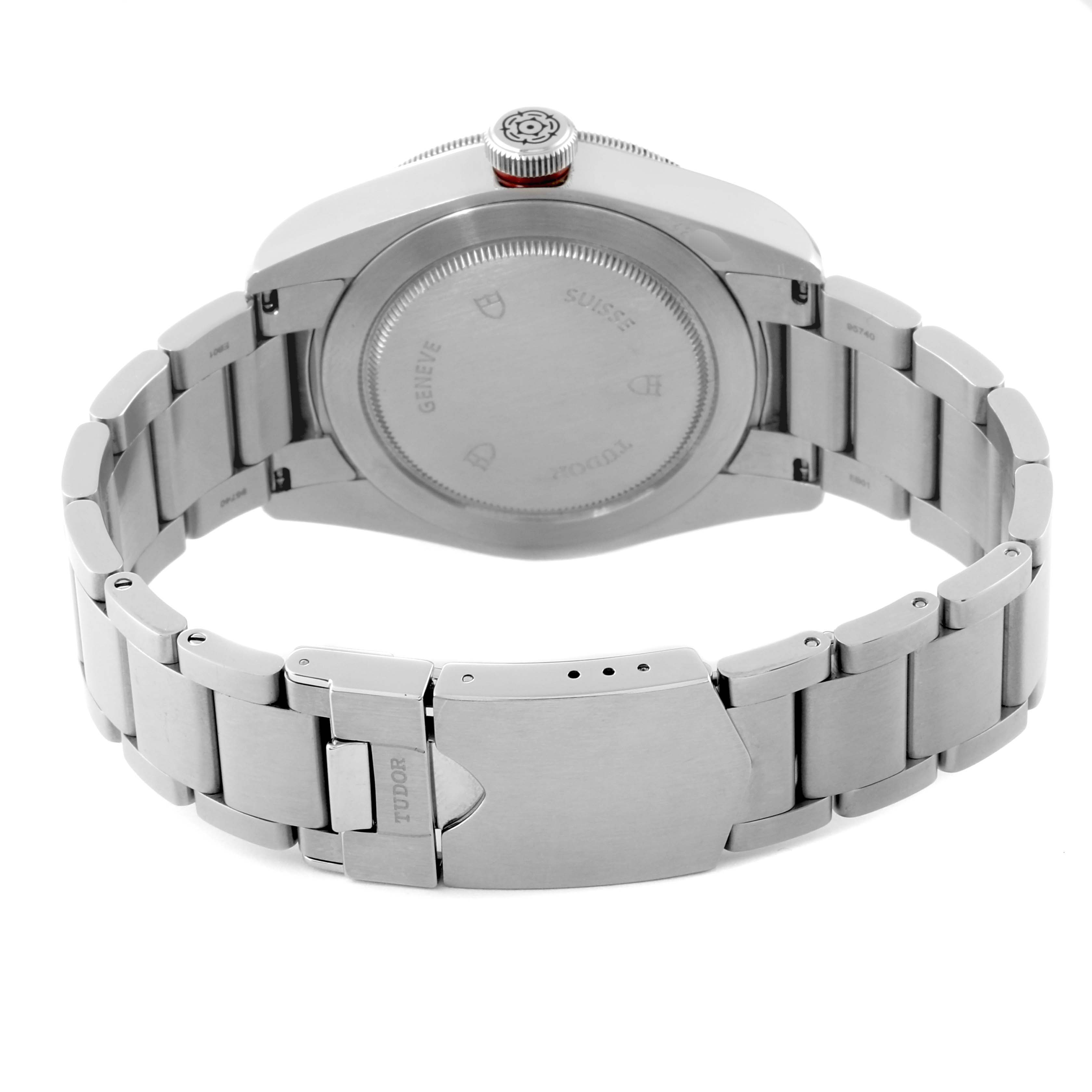 The image shows the back case and bracelet of the Tudor Heritage Black Bay 79220R Men
s Stainless Steel Black Dial 79220R Men
s Stainless Steel Black Dial watch from a rear angle.