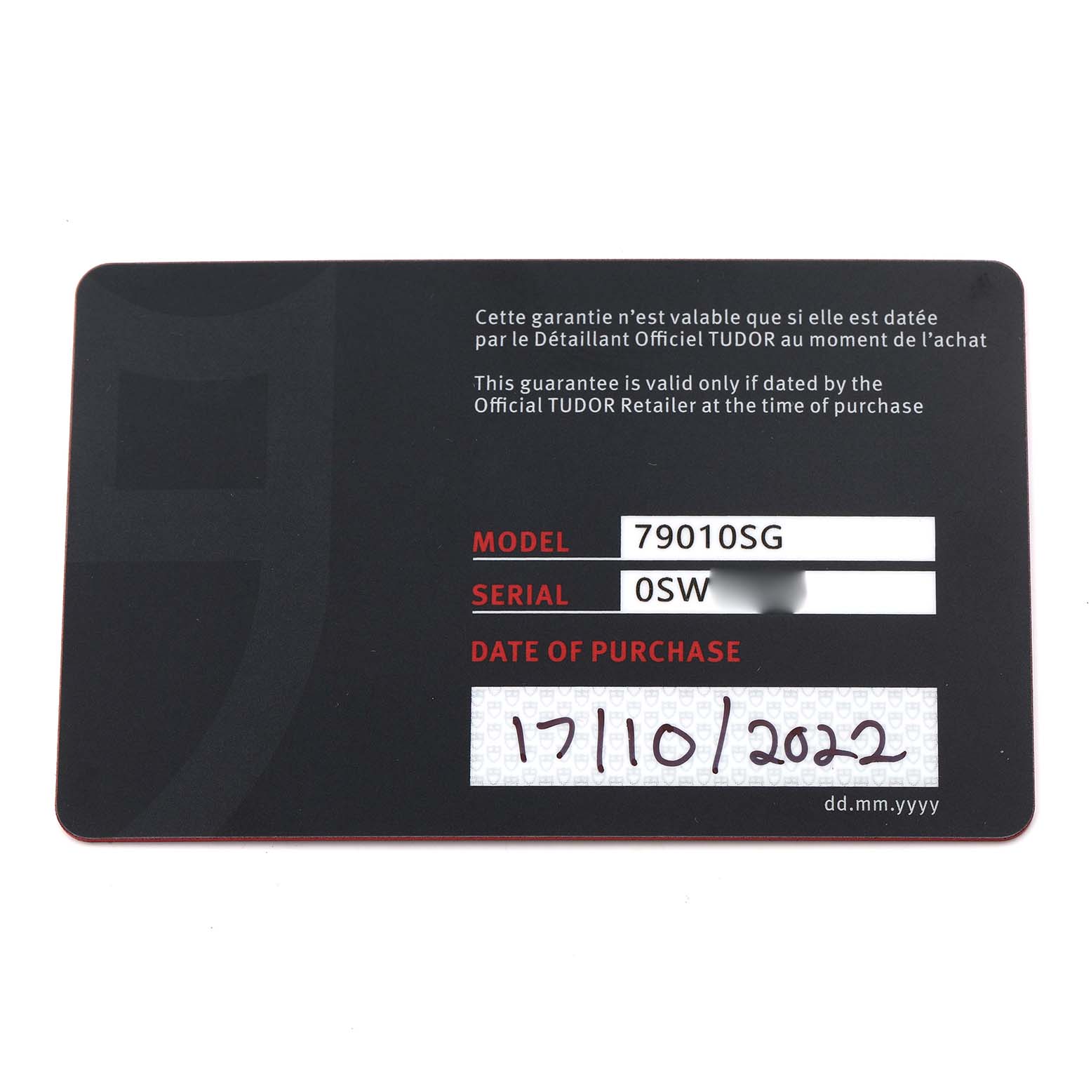 The image shows the guarantee card for the Tudor Heritage Black Bay 79010 Men
s Stainless Steel Grey Dial 79010 Men
s Stainless Steel Grey Dial watch, displaying model and serial numbers.