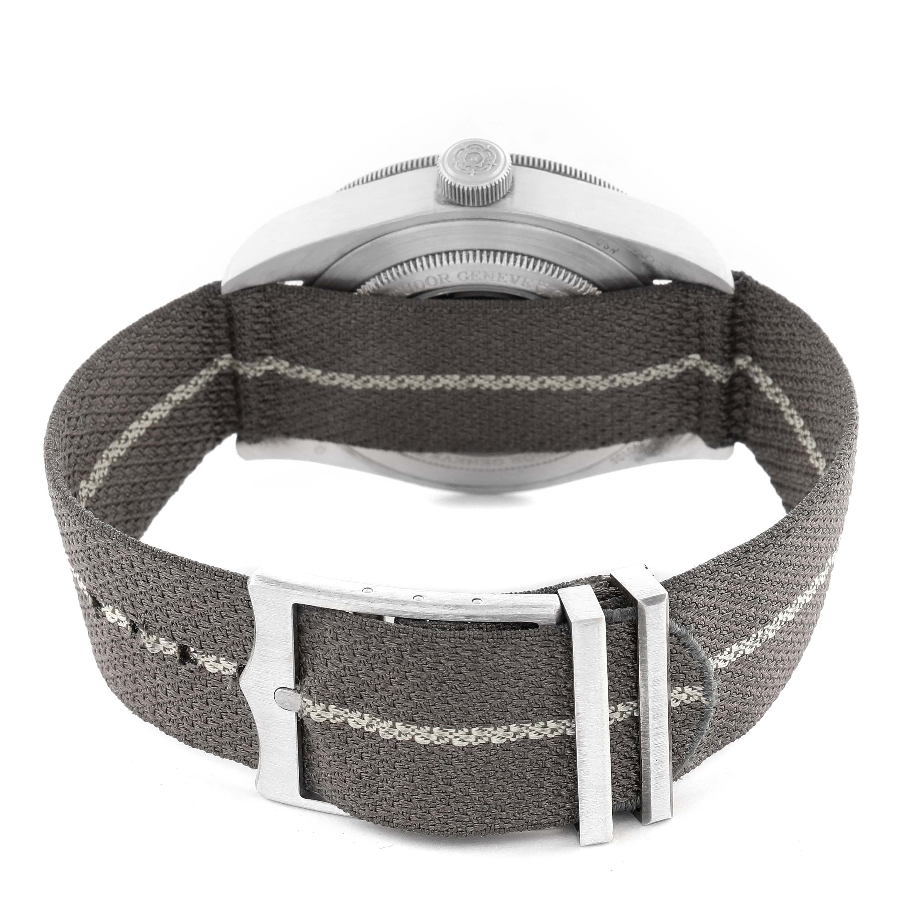 The image shows the back view of a Tudor Heritage Black Bay 79010 Men
s Stainless Steel Grey Dial 79010 Men
s Stainless Steel Grey Dial watch focusing on the strap and buckle.