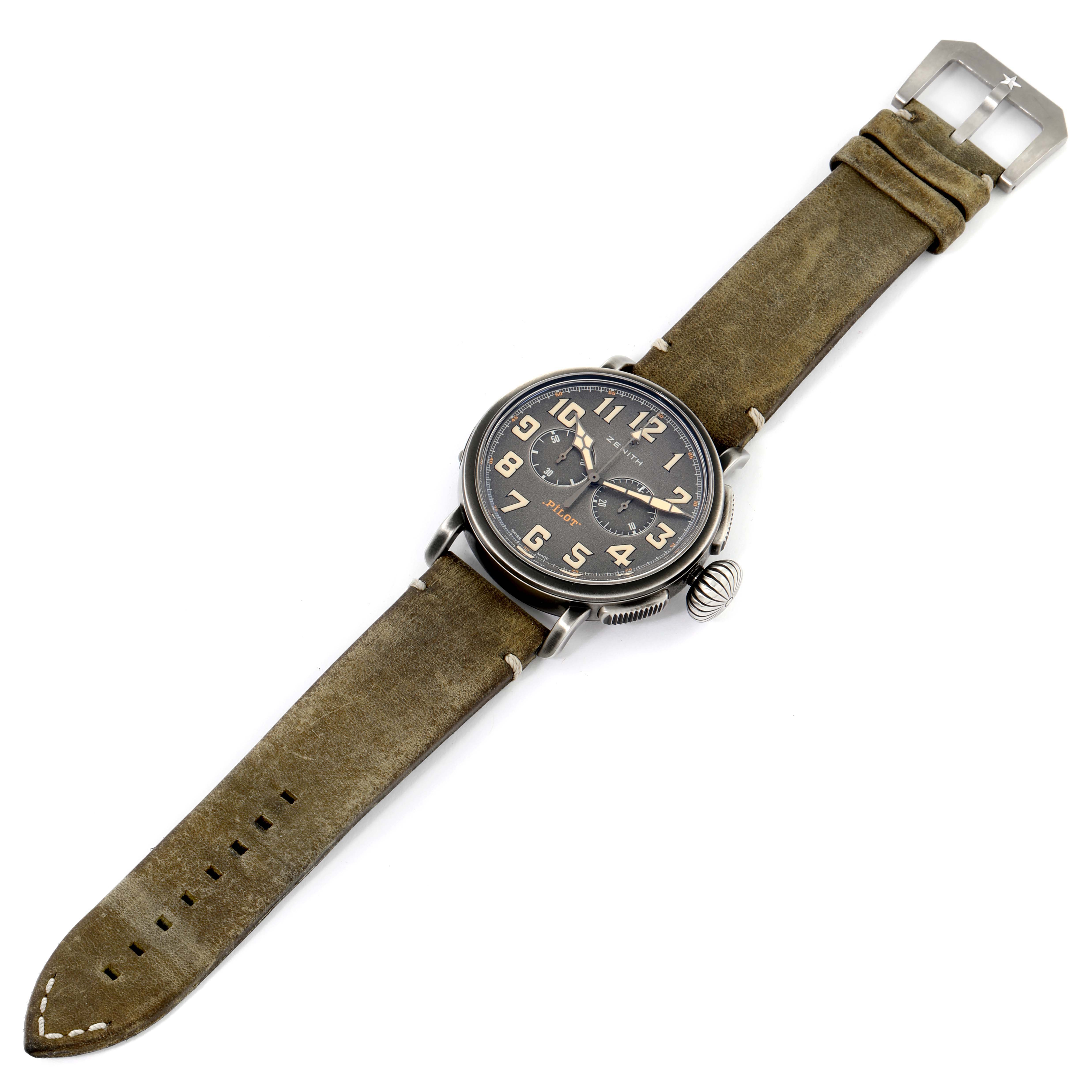 The Zenith Pilot 11.2430.4069/21.C773 Men's Stainless Steel Grey Dial 11.2430.4069/21.C773 Men's Stainless Steel Grey Dial watch is shown fully extended, displaying the face, crown, and brown leather strap with buckle.