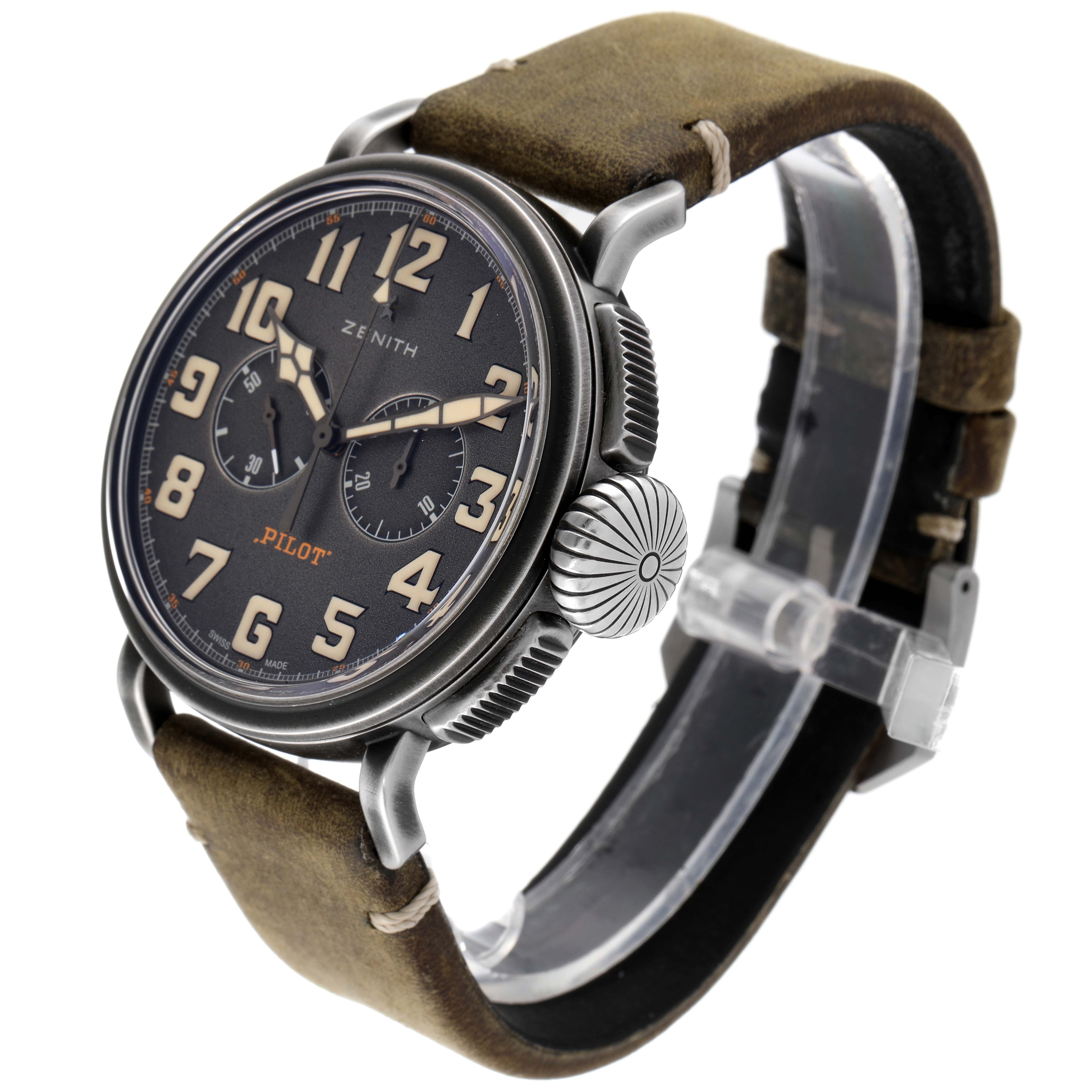 The image shows a Zenith Pilot 11.2430.4069/21.C773 Men's Stainless Steel Grey Dial 11.2430.4069/21.C773 Men's Stainless Steel Grey Dial watch at an angled view, displaying its face, crown, and leather strap.