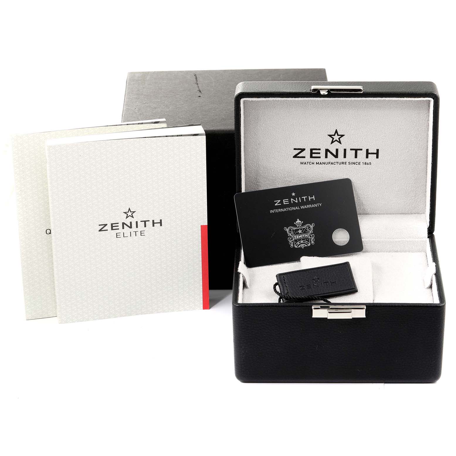 The image shows the packaging and accessories for a Zenith Pilot 11.2430.4069/21.C773 Men's Stainless Steel Grey Dial 11.2430.4069/21.C773 Men's Stainless Steel Grey Dial model watch, including manuals, warranty card, and a watch box.