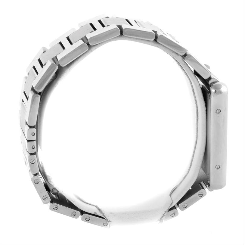 The image shows the side view and metal bracelet of the Tank Solo model by Cartier.