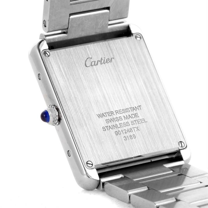 The image shows the back case and part of the bracelet of a Cartier Tank Solo W5200014 Men's Stainless Steel Silver Dial W5200014 Men's Stainless Steel Silver Dial watch.