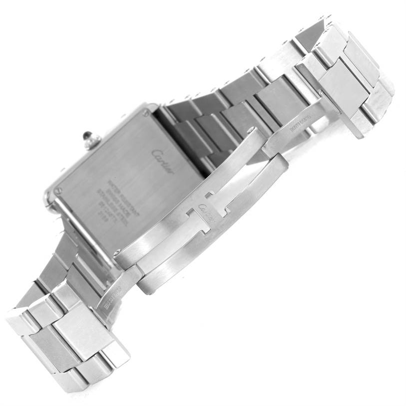 The image shows the back case and metal bracelet clasp of a Cartier Tank Solo W5200014 Men's Stainless Steel Silver Dial W5200014 Men's Stainless Steel Silver Dial watch.
