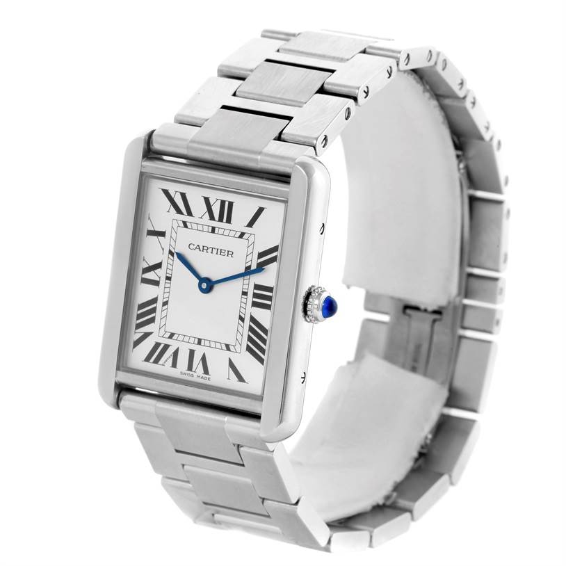 This image shows a Cartier Tank Solo W5200014 Stainless Steel Silver Dial W5200014 Stainless Steel Silver Dial watch at an angle highlighting its rectangular face, stainless steel bracelet, and blue cabochon crown.