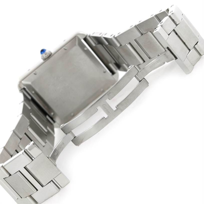 The image shows the back and metal bracelet of a Cartier Tank Solo W5200028 Men
s Stainless Steel Silver Dial W5200028 Men
s Stainless Steel Silver Dial watch from an angled view.