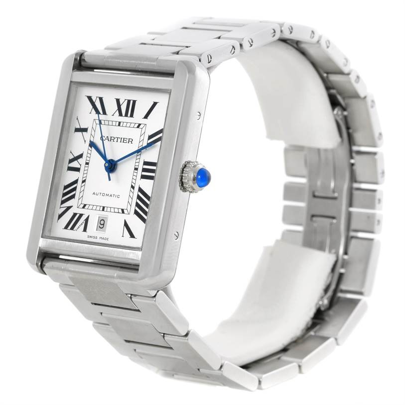 The image shows a Cartier Tank Solo W5200028 Men
s Stainless Steel Silver Dial W5200028 Men
s Stainless Steel Silver Dial watch with a silver bracelet, rectangular face, and blue sapphire crown at an angled view.