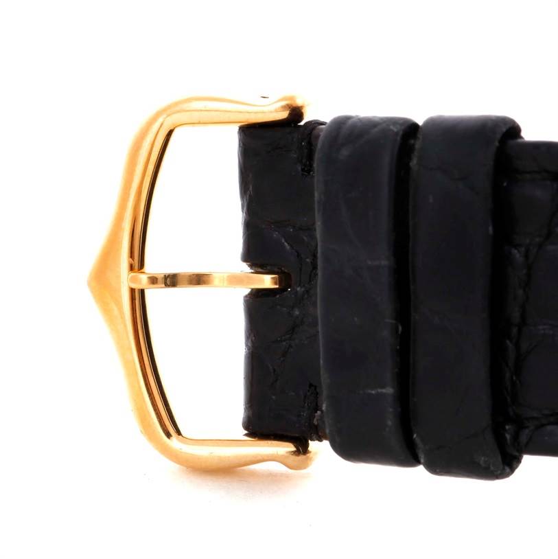 This image shows a close-up of the buckle and part of the leather strap of a Cartier Tank Solo W1018855 Men
s Steel and Gold (two tone) Silver Dial W1018855 Men
s Steel and Gold (two tone) Silver Dial watch.