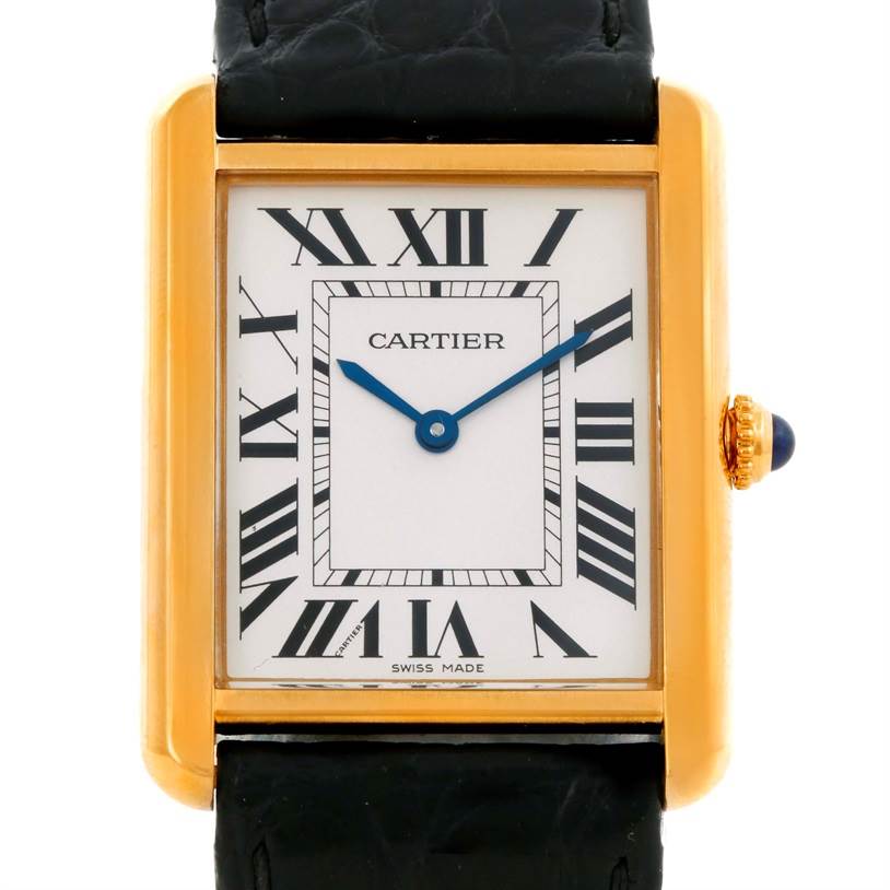 The image shows a front view of a Cartier Tank Solo W1018855 Men
s Steel and Gold (two tone) Silver Dial W1018855 Men
s Steel and Gold (two tone) Silver Dial watch, highlighting the face, case, and a portion of the strap.