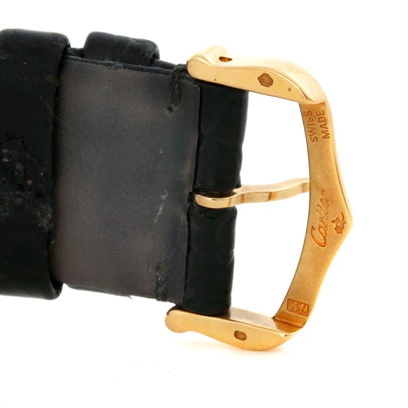 This image shows a close-up of the clasp and the end of the strap of a Cartier Tank Solo W1018855 Men
s Steel and Gold (two tone) Silver Dial W1018855 Men
s Steel and Gold (two tone) Silver Dial watch.