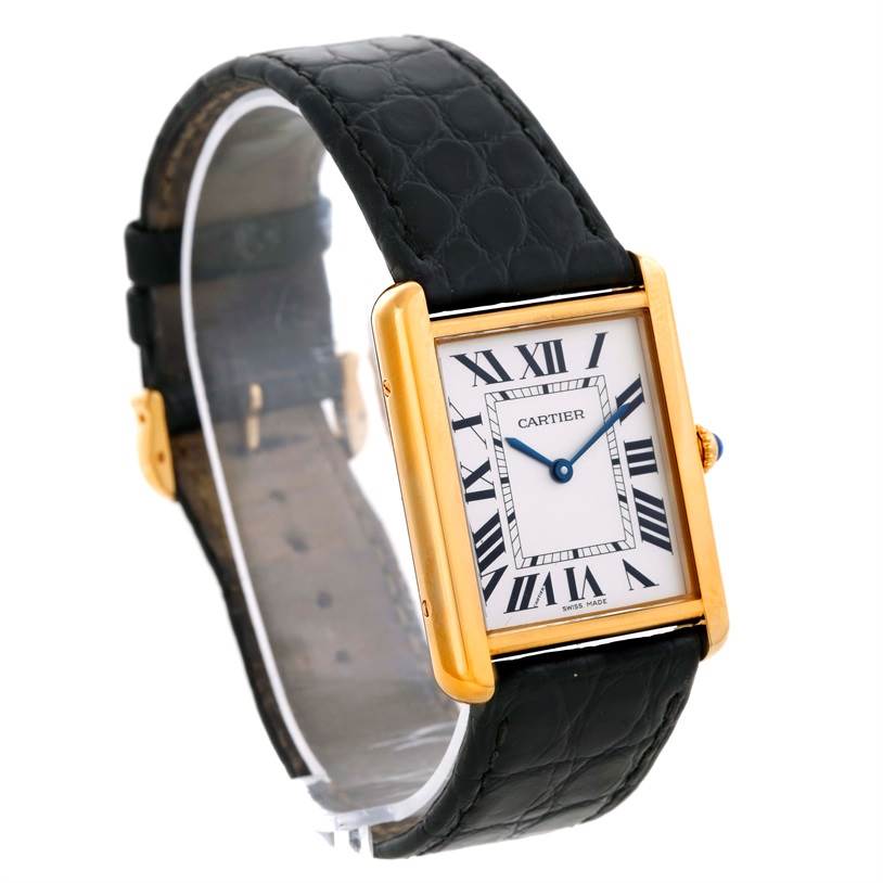 The image shows a Cartier Tank Solo W1018855 Men
s Steel and Gold (two tone) Silver Dial W1018855 Men
s Steel and Gold (two tone) Silver Dial watch at a three-quarter angle, highlighting its rectangular dial, Roman numerals, and black leather strap.