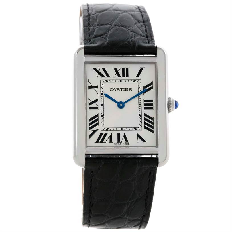 The image shows a front view of a Cartier Tank Solo W1018355 Men
s Stainless Steel Silver Dial W1018355 Men
s Stainless Steel Silver Dial watch, highlighting its face, Roman numerals, blue hands, and black leather strap.