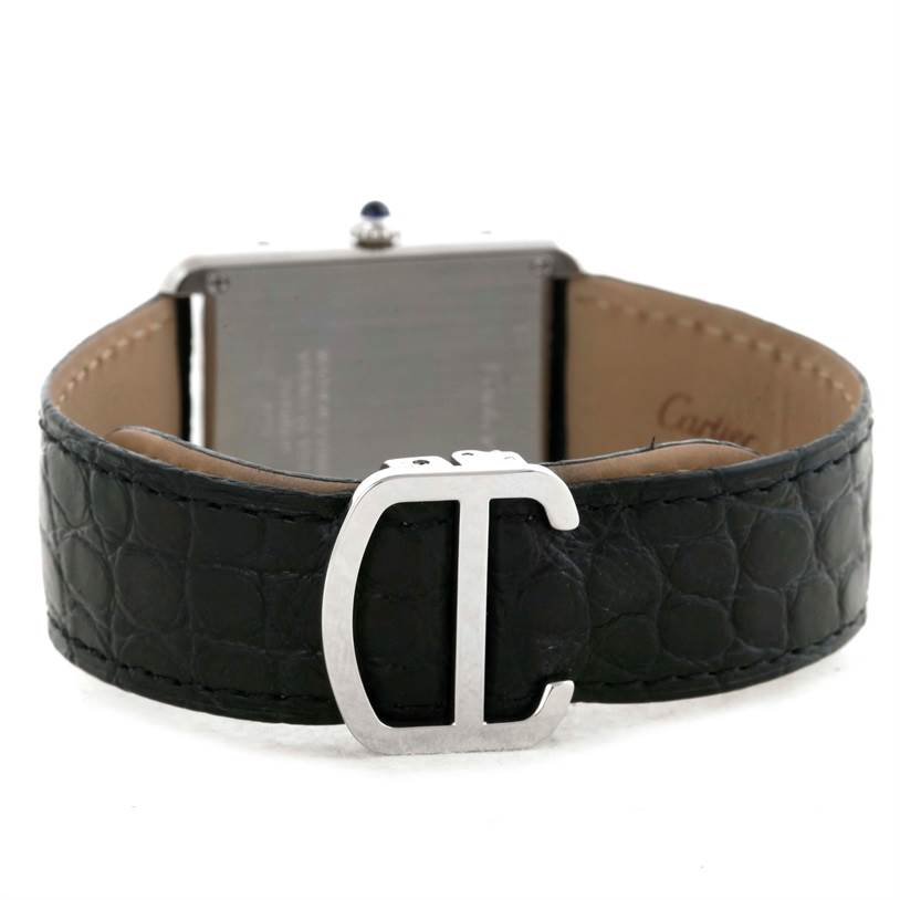 This image displays the back of a Cartier Tank Solo W1018355 Men
s Stainless Steel Silver Dial W1018355 Men
s Stainless Steel Silver Dial watch, focusing on the black leather strap and clasp.
