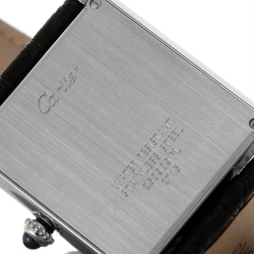 This image shows the back plate and part of the crown of a Cartier Tank Solo W1018355 Men
s Stainless Steel Silver Dial W1018355 Men
s Stainless Steel Silver Dial watch.
