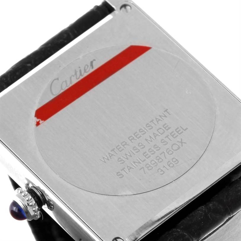 The image shows the case back and crown with a blue cabochon of the Cartier Tank Solo W1018355 Stainless Steel Silver Dial W1018355 Stainless Steel Silver Dial watch.