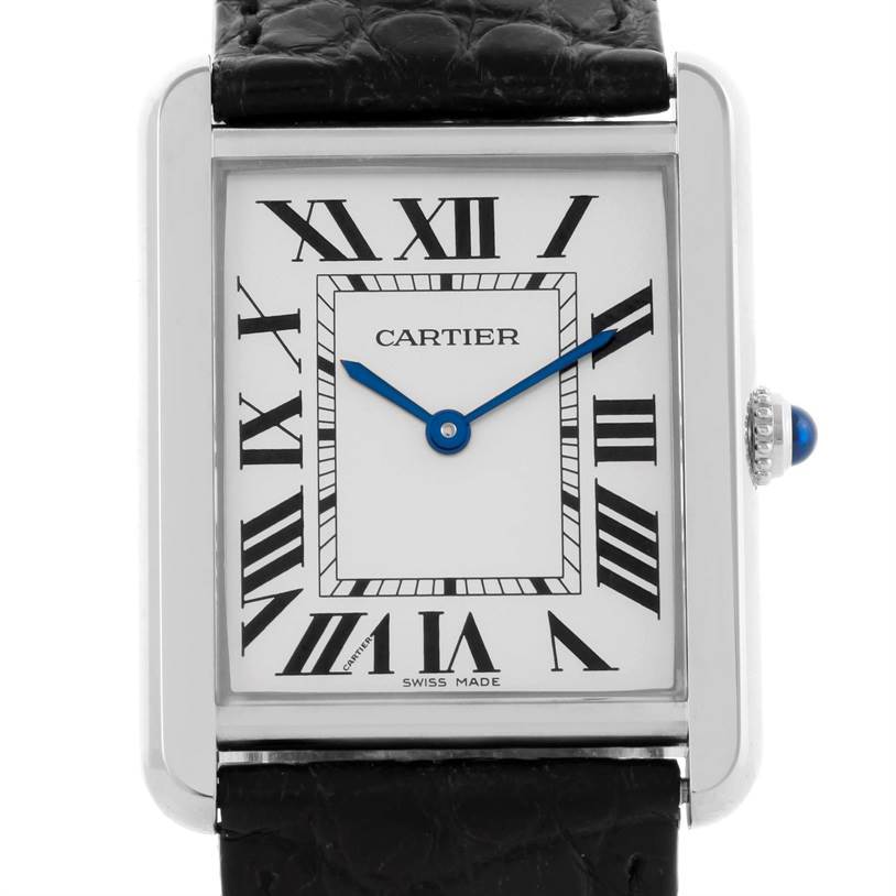The image shows a front view of a Cartier Tank Solo W1018355 Stainless Steel Silver Dial W1018355 Stainless Steel Silver Dial watch, highlighting its face, roman numerals, blue hands, and crown.