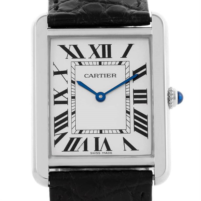 The image shows a front view of a Cartier Tank Solo watch, highlighting its face, roman numerals, blue hands, and crown.