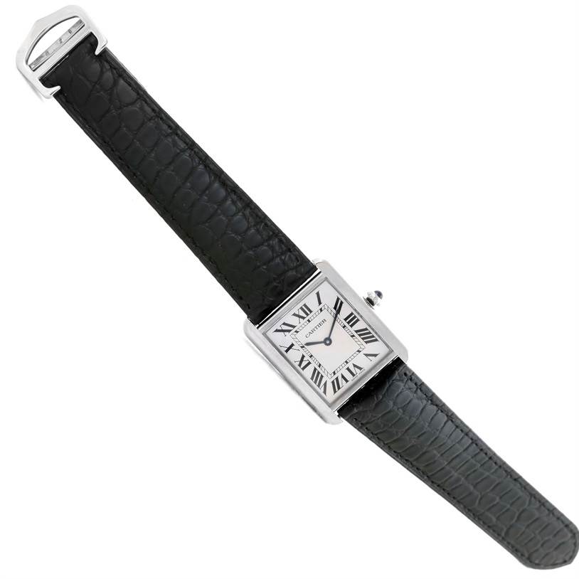 The image shows a top view of a Cartier Tank Solo W1018355 Stainless Steel Silver Dial W1018355 Stainless Steel Silver Dial watch, highlighting the rectangular dial and black leather strap.