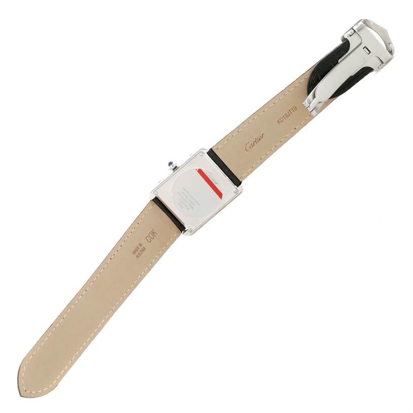 The image shows the back view of the Cartier Tank Solo W1018355 Stainless Steel Silver Dial W1018355 Stainless Steel Silver Dial watch, including its leather strap and clasp.