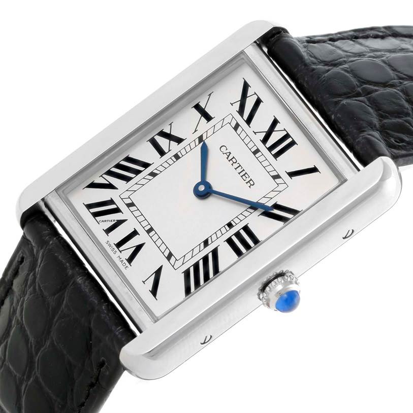 The image shows a close-up of the face and strap of a Cartier Tank Solo W1018355 Stainless Steel Silver Dial W1018355 Stainless Steel Silver Dial watch, highlighting the Roman numerals and blue hands.