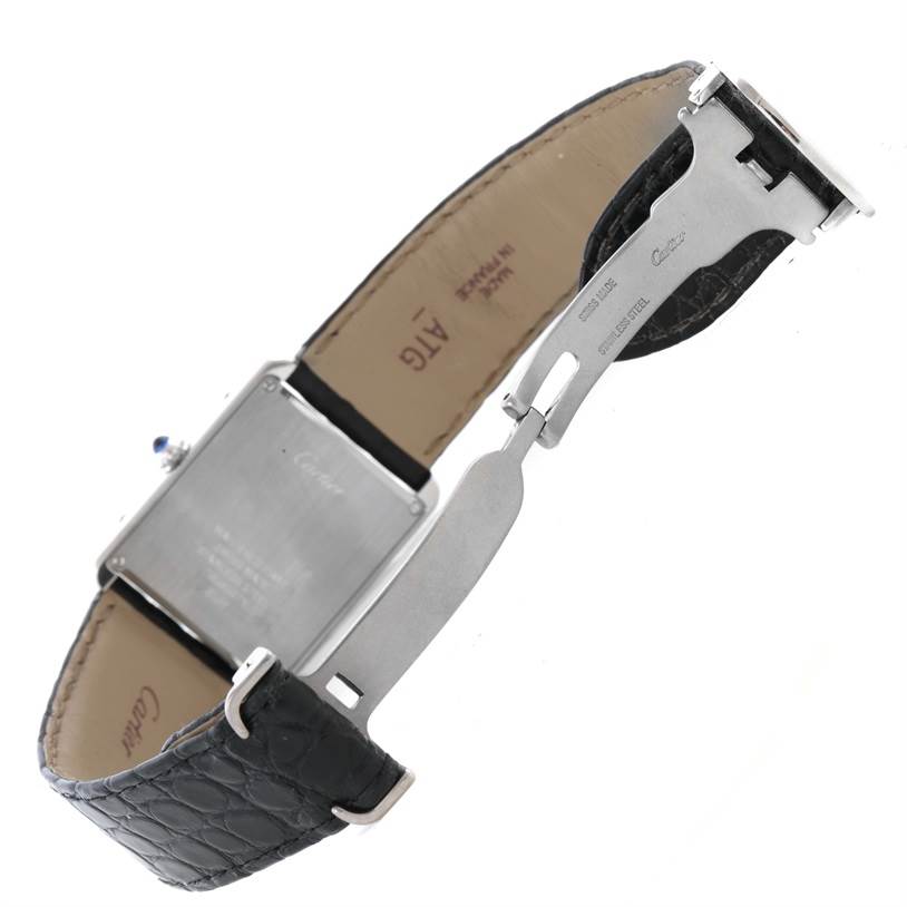 This image shows the underside of a Cartier Tank Solo W1018355 Men's Stainless Steel Silver Dial W1018355 Men's Stainless Steel Silver Dial watch, highlighting the clasp and strap.
