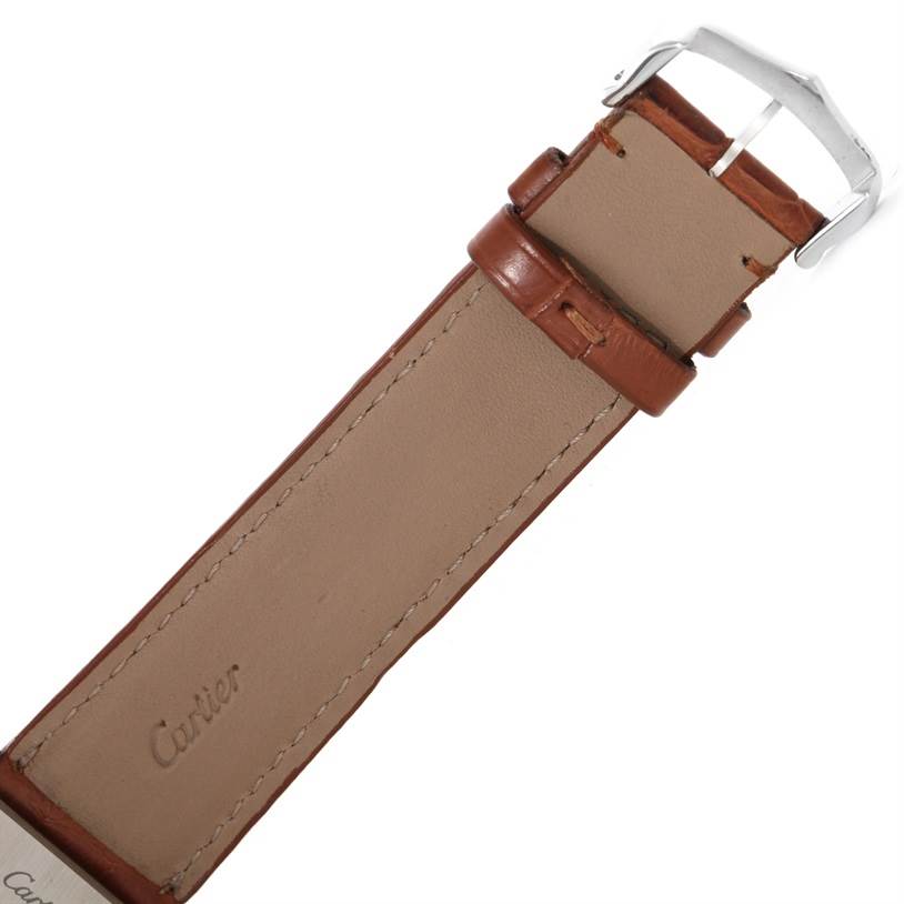 This image shows the leather strap and buckle of the Cartier Tank Solo W1018355 Men
s Stainless Steel Silver Dial W1018355 Men
s Stainless Steel Silver Dial watch from a top angle.