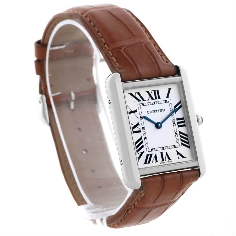 The Cartier Tank Solo W1018355 Men
s Stainless Steel Silver Dial W1018355 Men
s Stainless Steel Silver Dial watch is shown at a slight angle, highlighting its Roman numeral dial and brown leather strap.